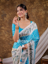 Vantara Turquoise Blue Satin Chiffon Printed Saree with Botanical Nature Print, Designer Tassel Pallu & Matching Blouse Piece