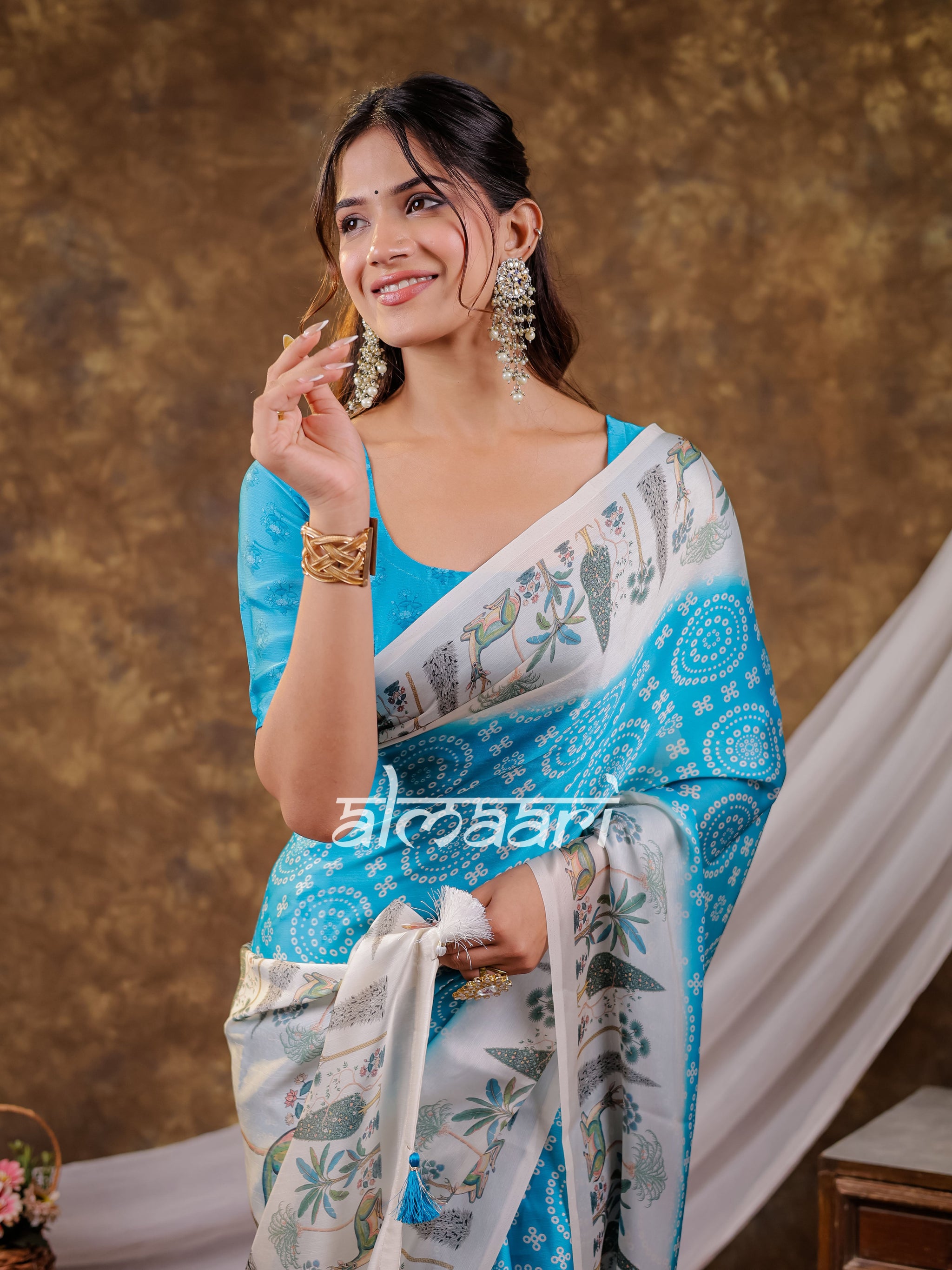 Vantara Turquoise Blue Satin Chiffon Printed Saree with Botanical Nature Print, Designer Tassel Pallu & Matching Blouse Piece