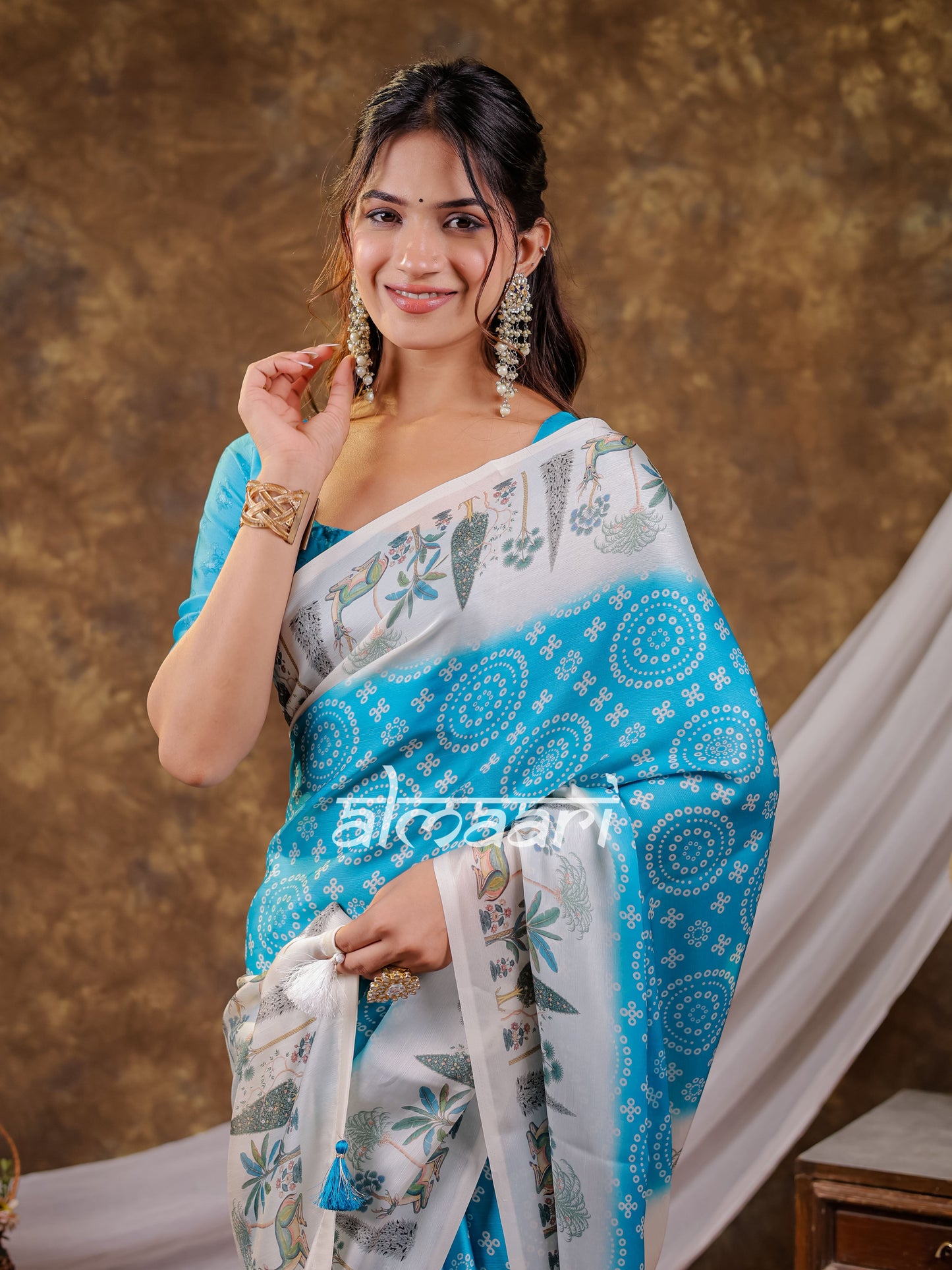 Vantara Turquoise Blue Satin Chiffon Printed Saree with Botanical Nature Print, Designer Tassel Pallu & Matching Blouse Piece