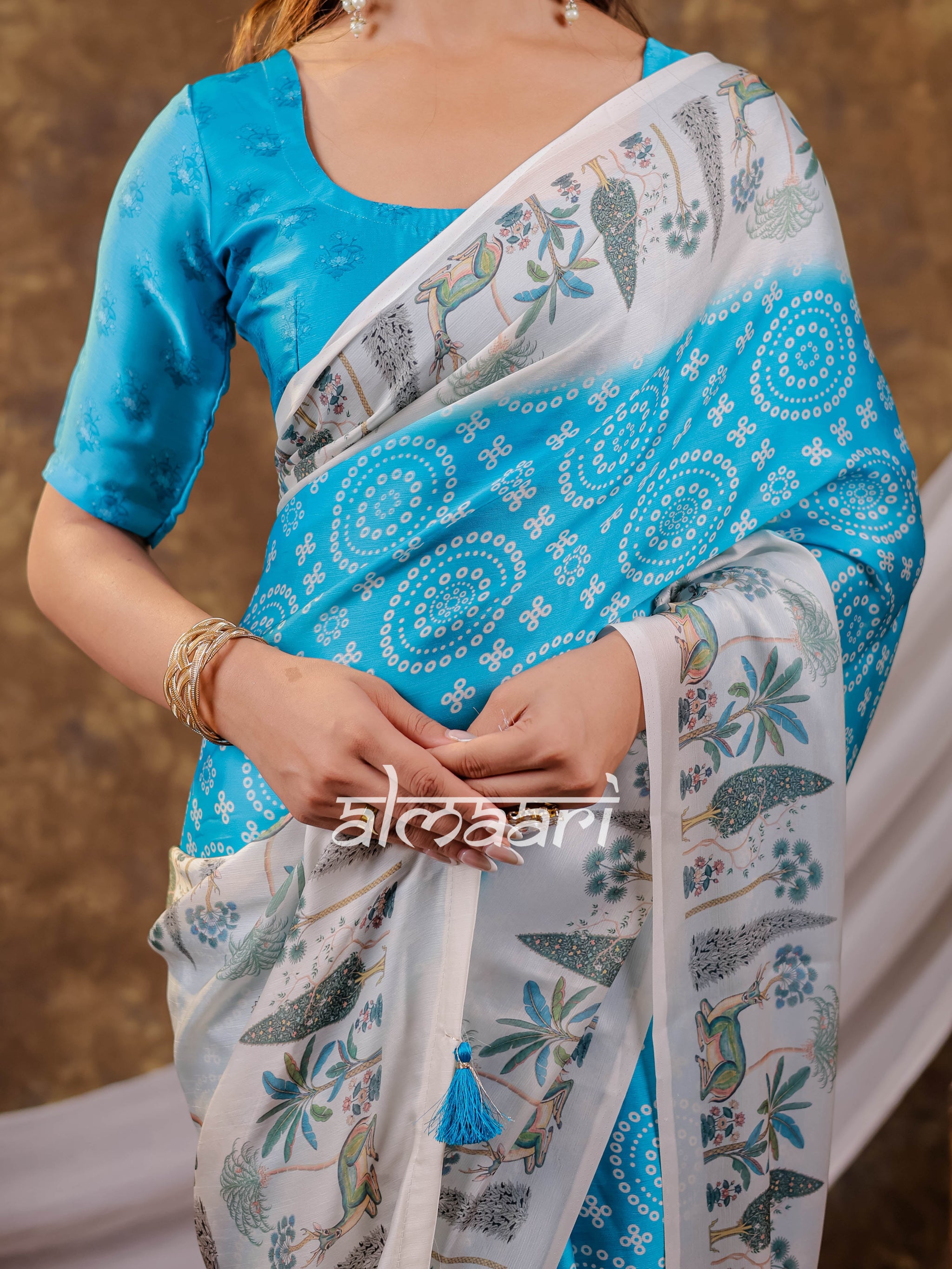 Vantara Turquoise Blue Satin Chiffon Printed Saree with Botanical Nature Print, Designer Tassel Pallu & Matching Blouse Piece