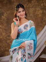 Vantara Turquoise Blue Satin Chiffon Printed Saree with Elephant & Peacock Heritage Print, Designer Tassel Pallu & Matching Blouse Piece