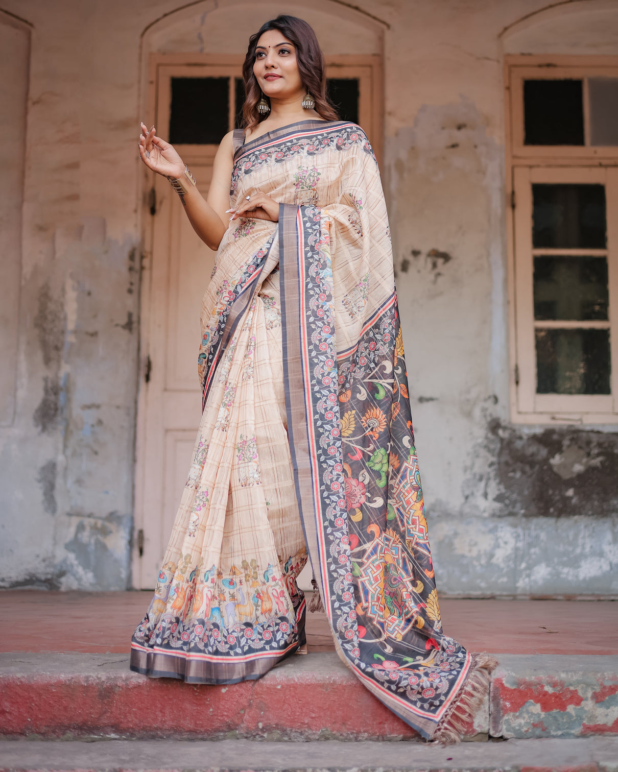 Designer beige saree with contrast black pallu exquisite ethnic patterns