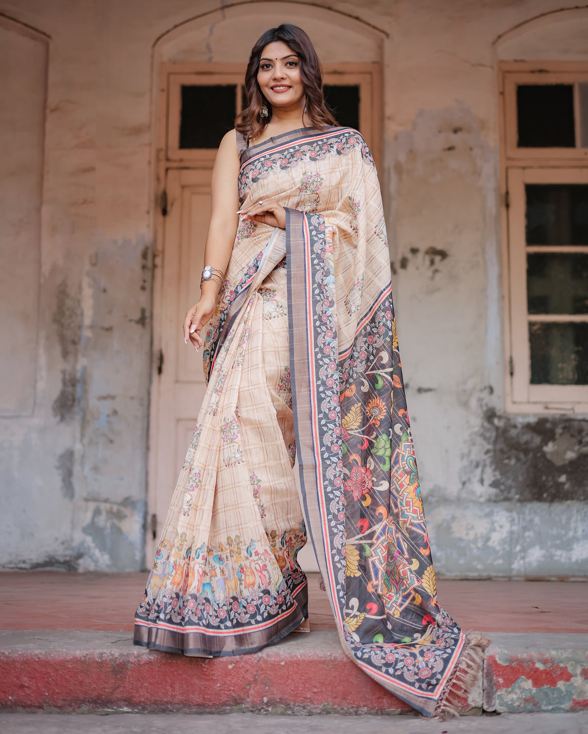 Designer beige saree with contrast black pallu exquisite ethnic patterns