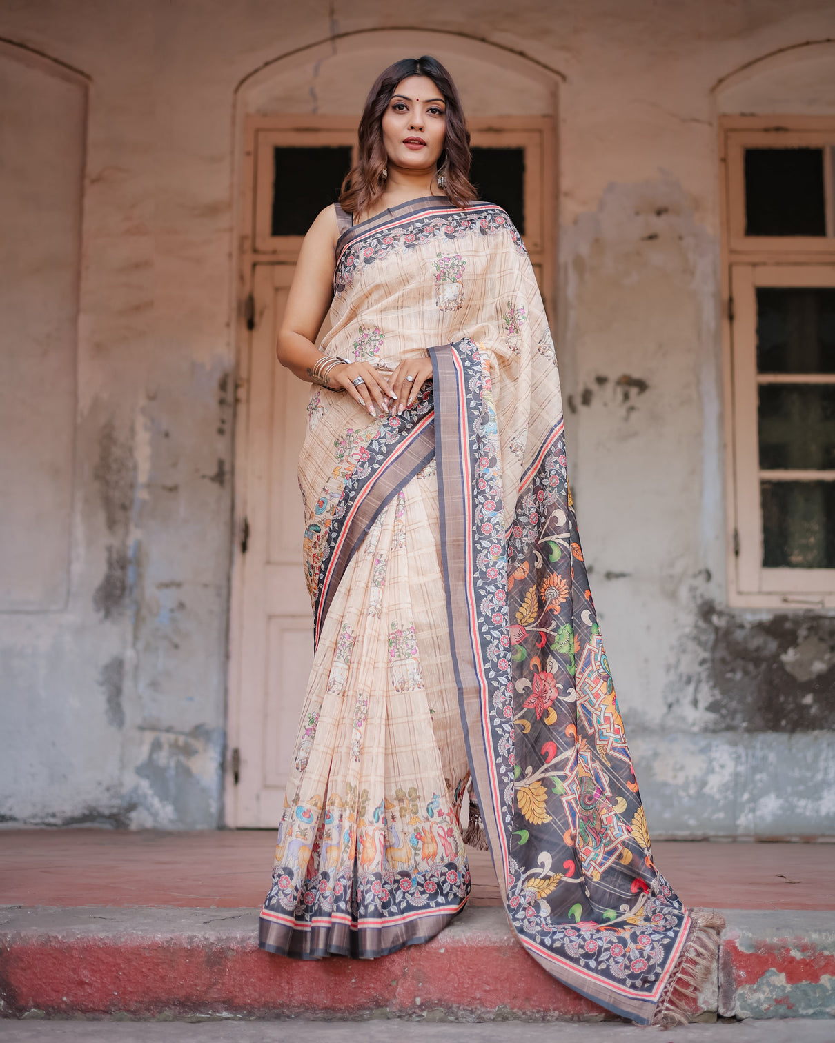 Designer beige saree with contrast black pallu exquisite ethnic patterns