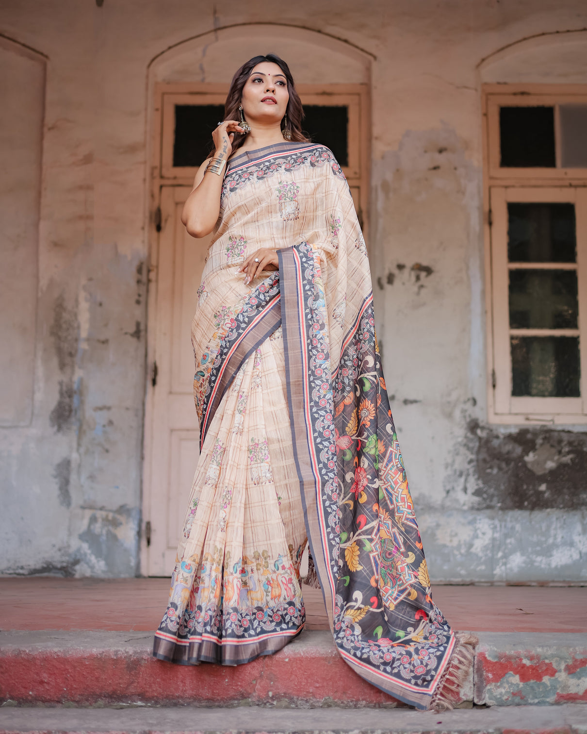 Designer beige saree with contrast black pallu exquisite ethnic patterns mameraa
