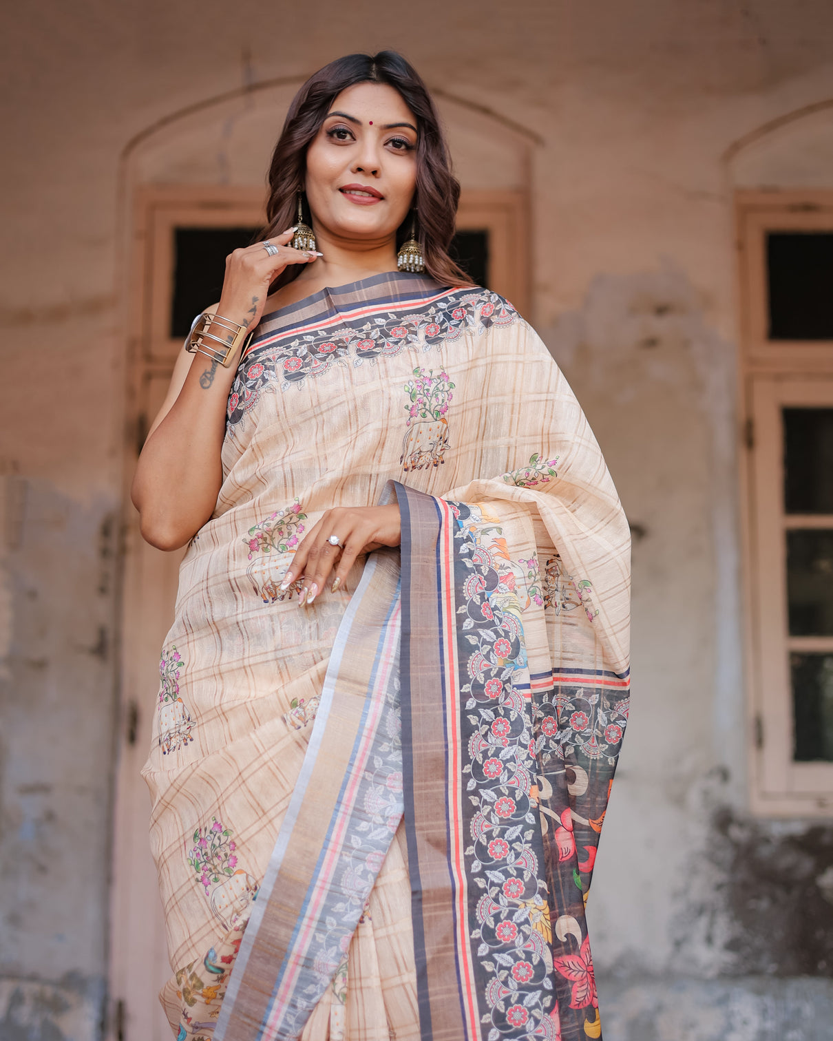 Designer beige saree with contrast black pallu exquisite ethnic patterns