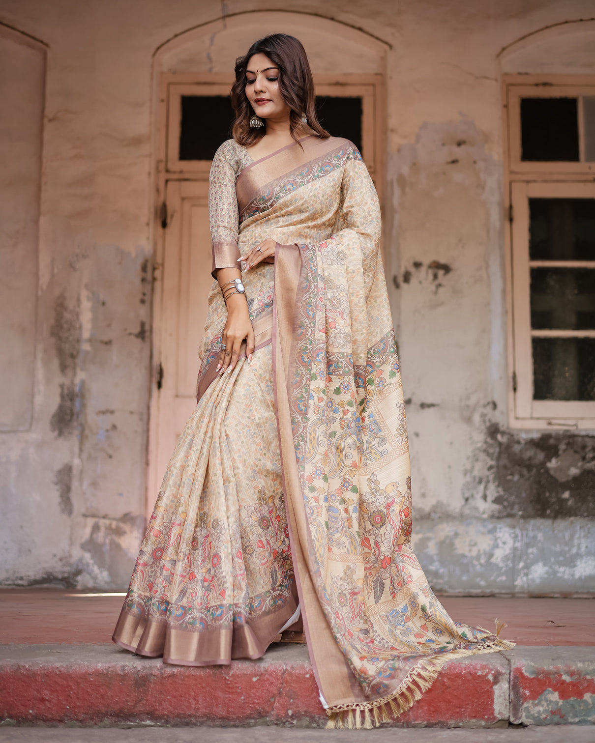 Luxurious off white silk saree with gold accents artistic detailing timeless fashion