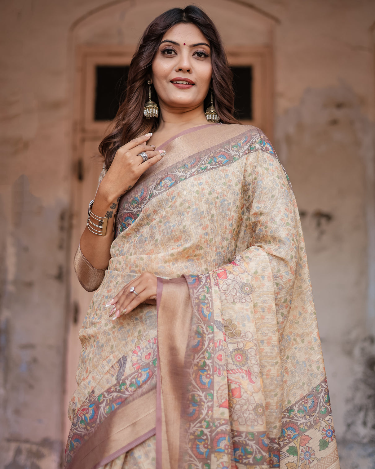 Luxurious off white silk saree with gold accents artistic detailing timeless fashion
