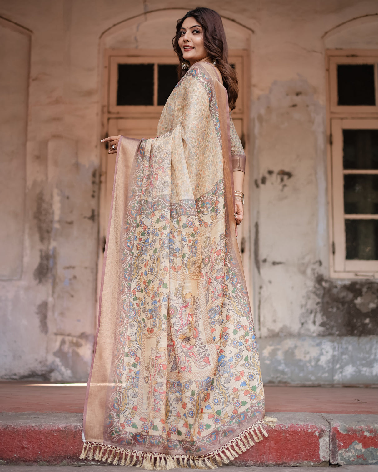Luxurious off white silk saree with gold accents artistic detailing timeless fashion