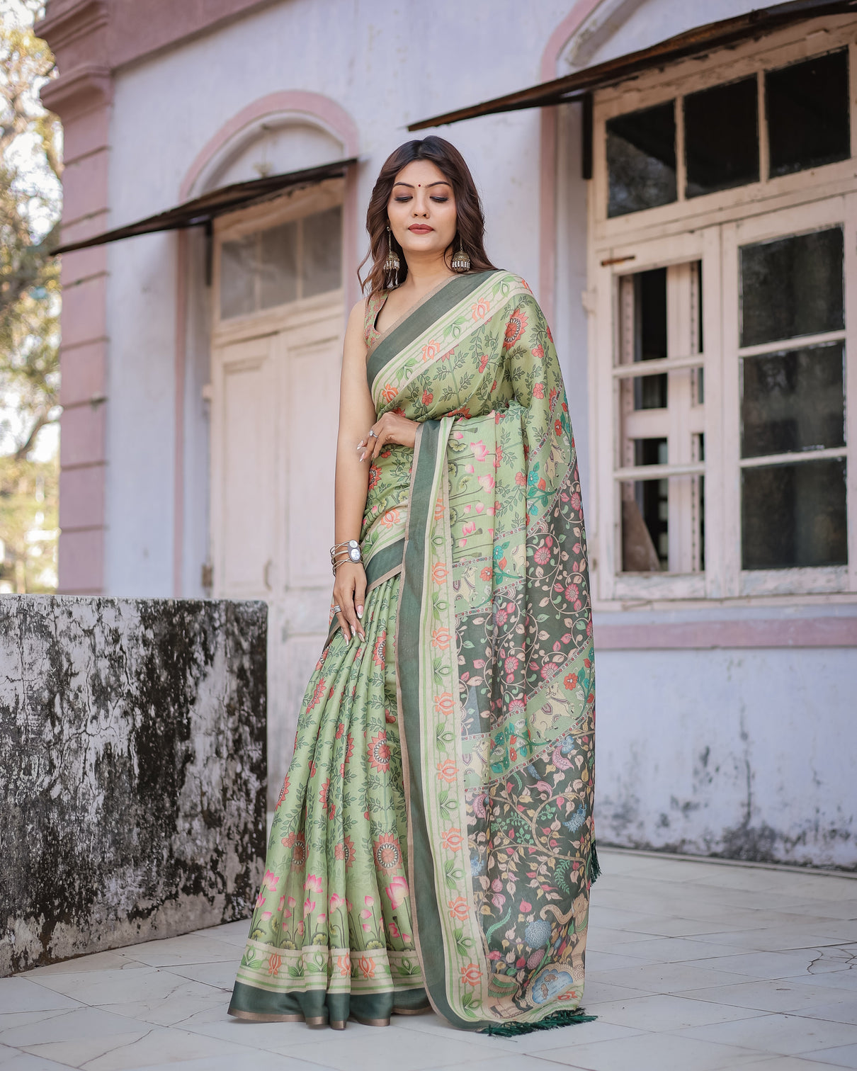 Graceful green beige saree with exquisite floral prints perfect for weddings festive wear