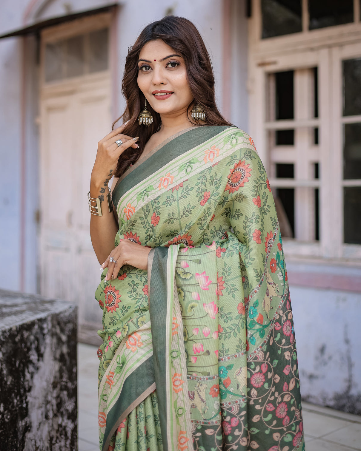 Graceful green beige saree with exquisite floral prints perfect for weddings festive wear