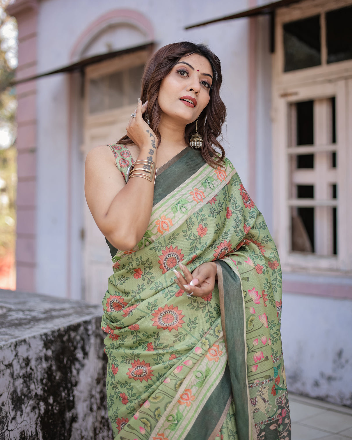 Graceful green beige saree with exquisite floral prints perfect for weddings festive wear
