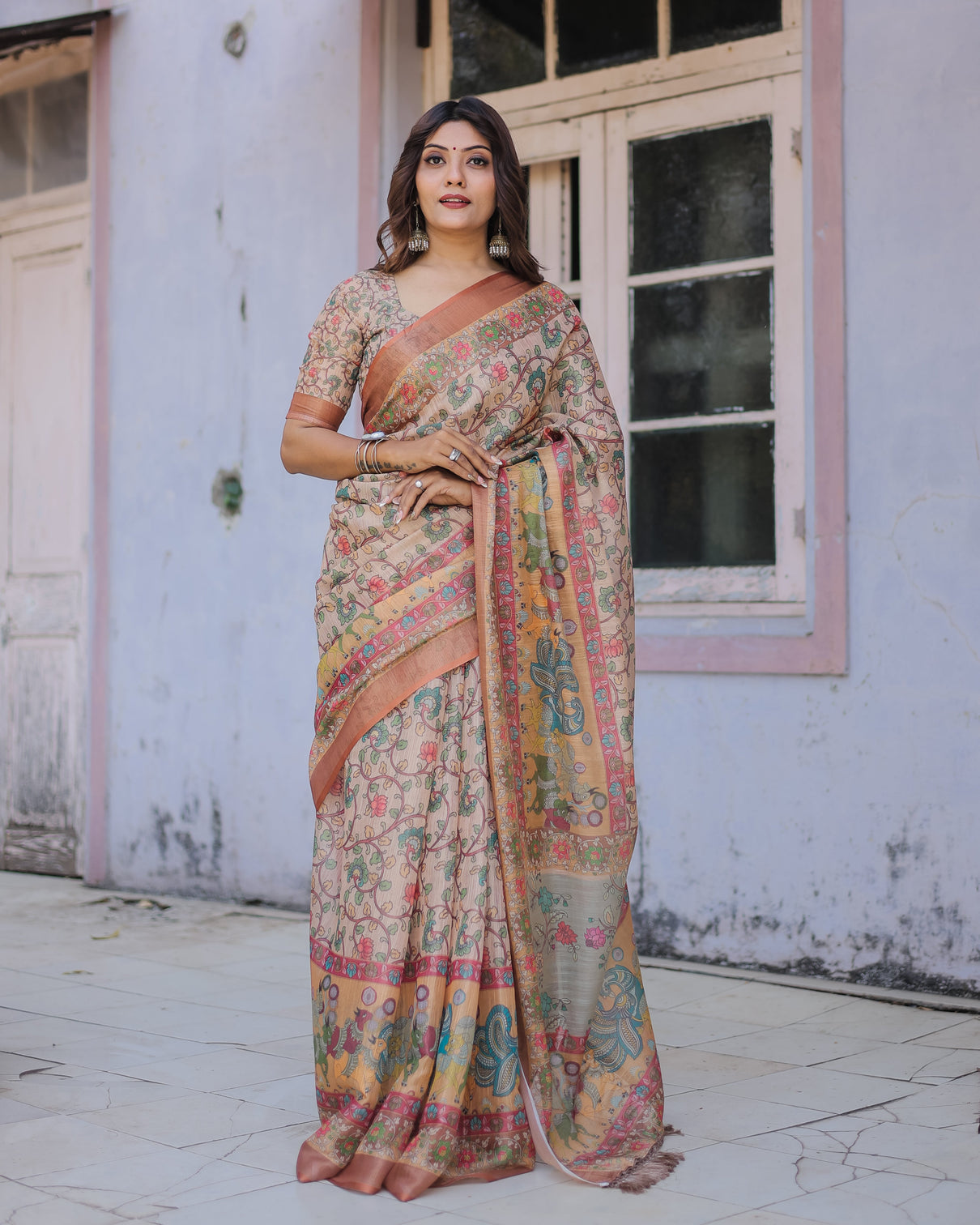 Handwoven beige peach saree with beautiful border detailing a timeless indian classic mameraa
