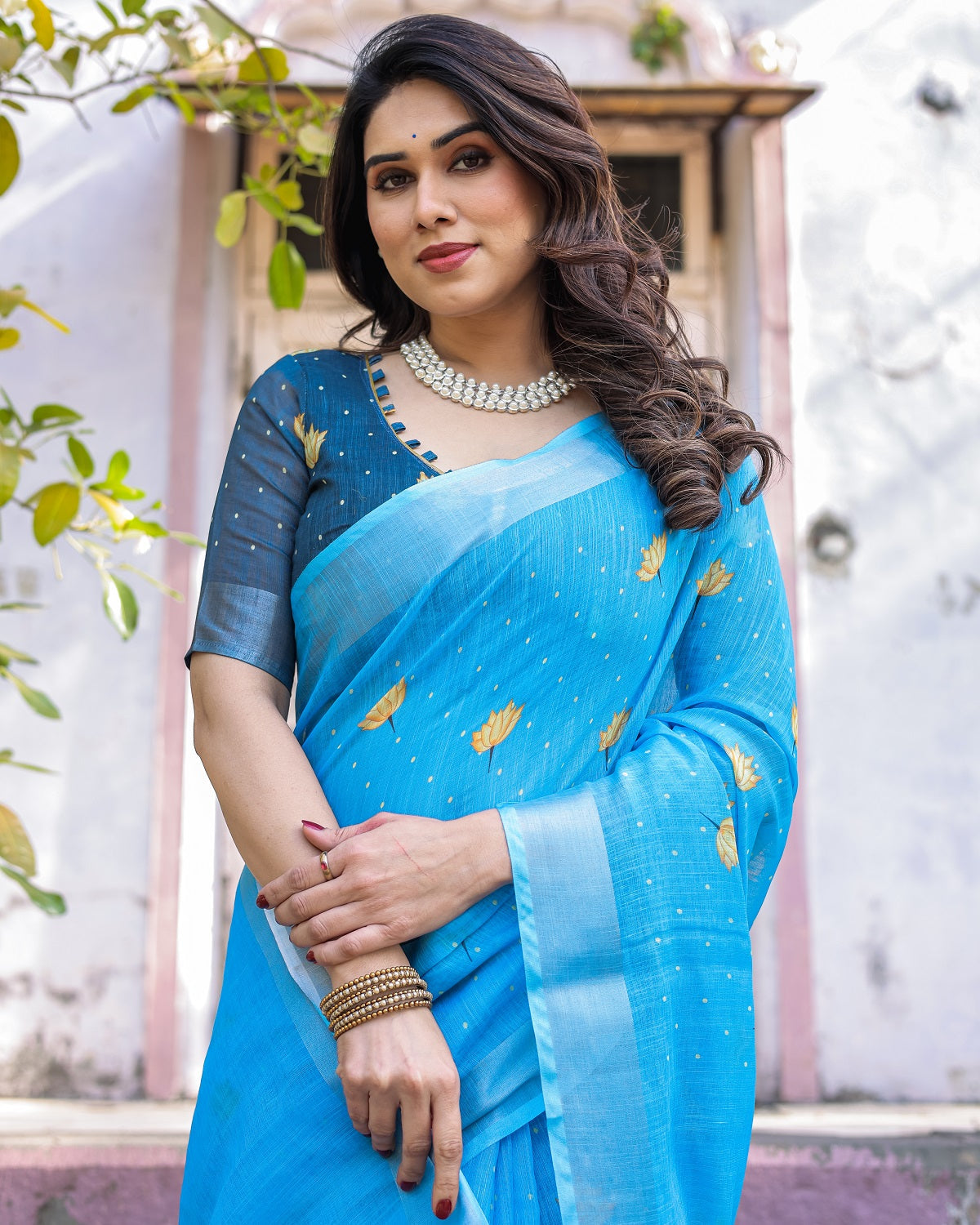 Elegant Sky Blue Linen Saree with White Lotus Print & Silver Zari Border