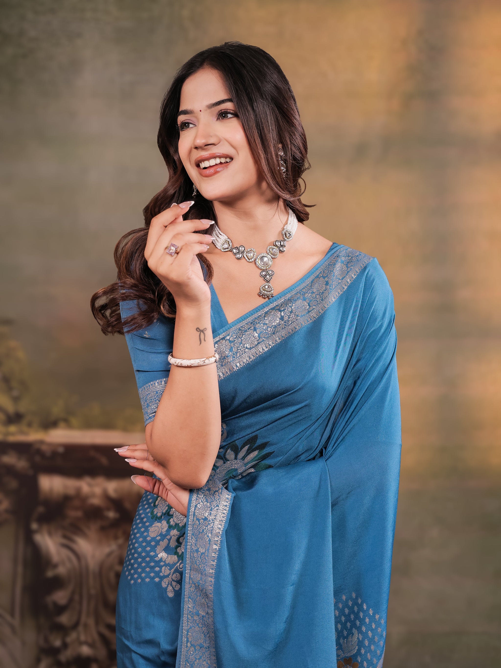 Sky Blue Nylon Viscose Pure Saree with Silver Woven Border, Floral Designer Motifs, Elegant Pallu & Tassel Edges