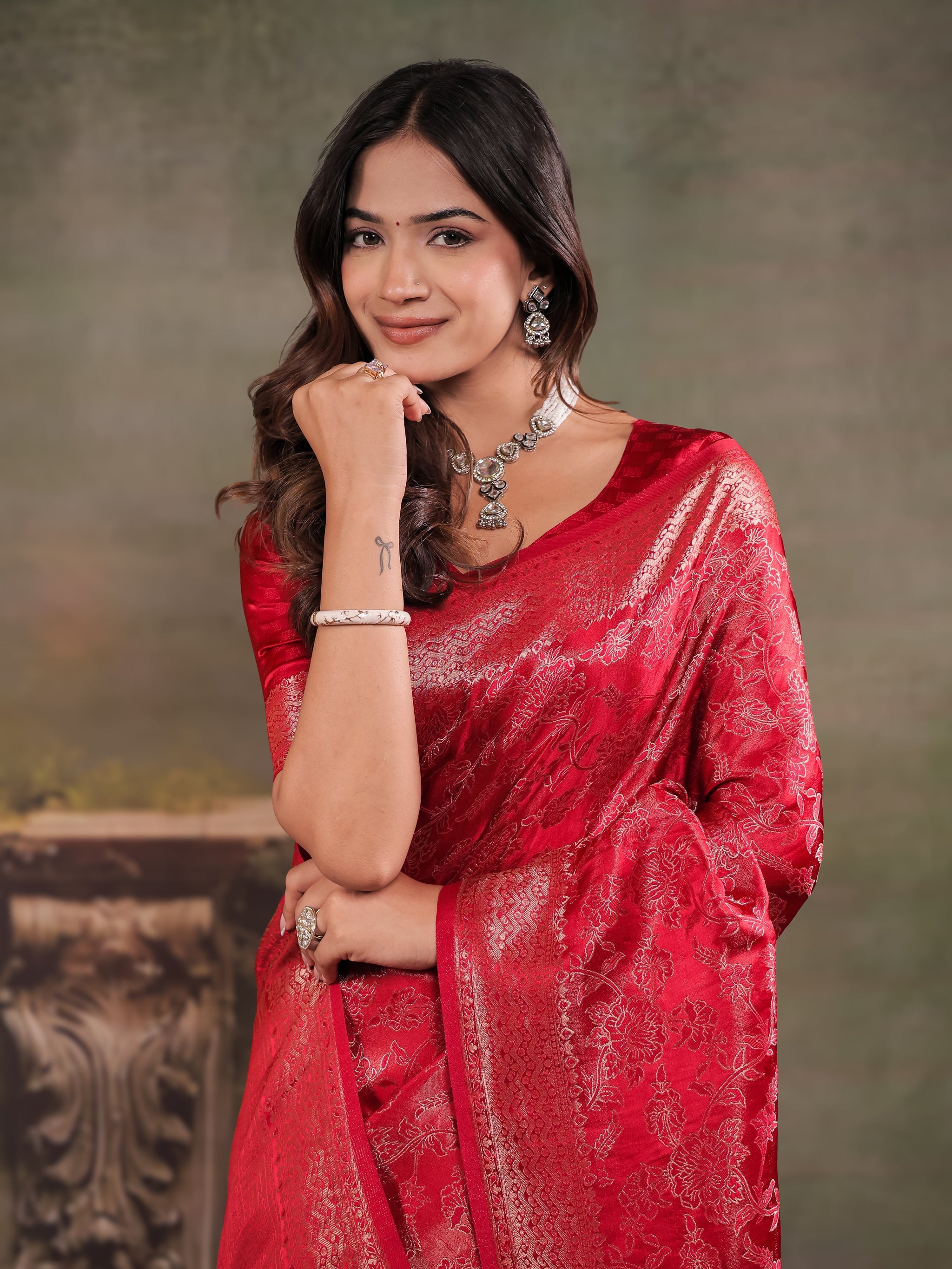 Ruby Red Satin Silk Saree with All-Over Floral Jacquard Weaving, Rich Zari Border, Grand Designer Pallu & Tassel Edges