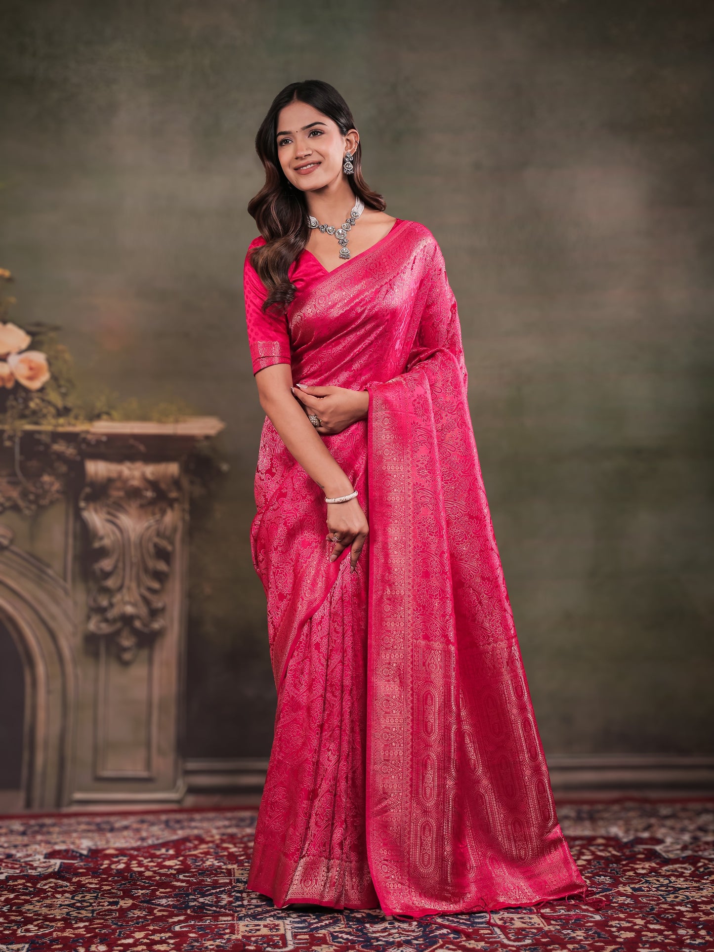 Rani Pink Satin Silk Saree with All-Over Floral Jacquard Weaving, Rich Zari Border, Grand Designer Pallu & Tassel Edges