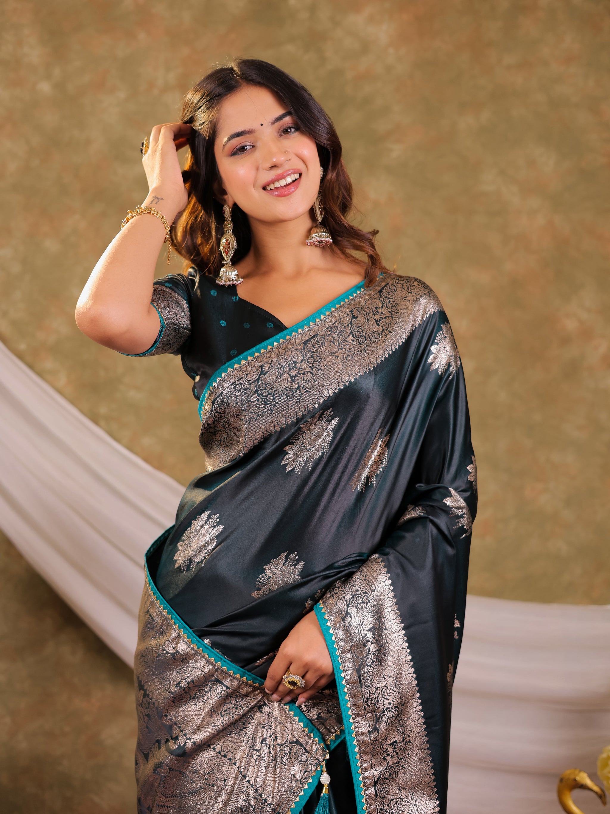 Teal Green Kanjivaram Banarasi Satin Silk Saree with Silver Zari Weaving, Heritage Floral Border & Tassel Detailing