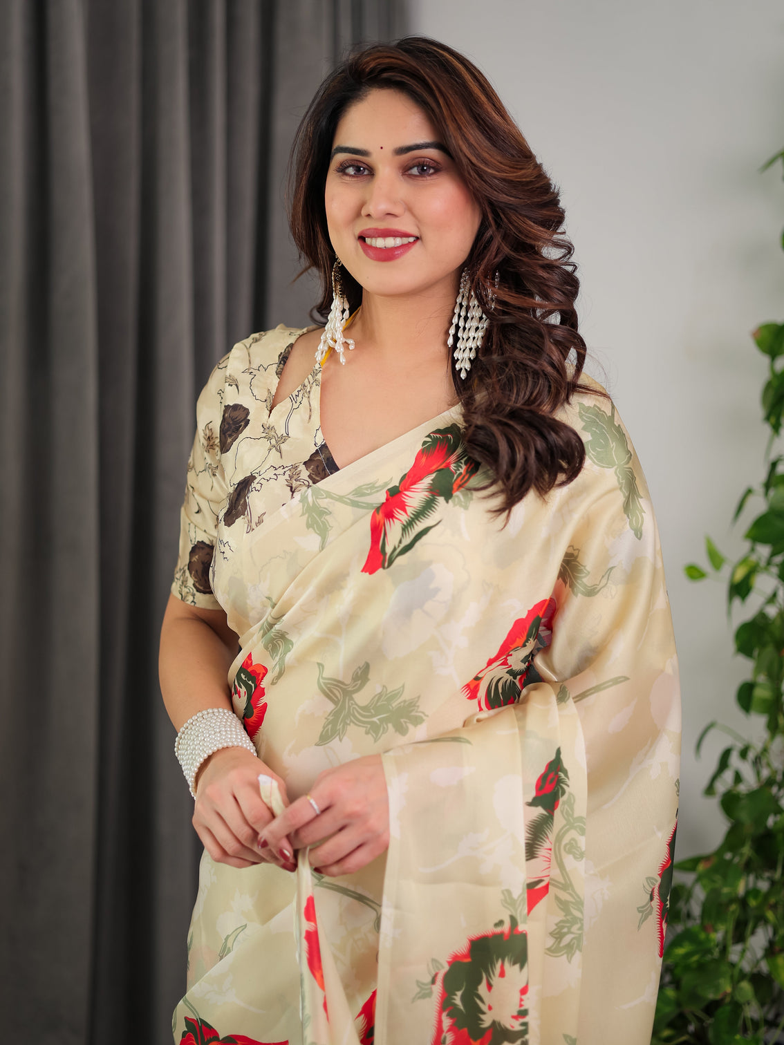 Cream floral satin georgette saree with red green artistic flower print and designer contrast blouse