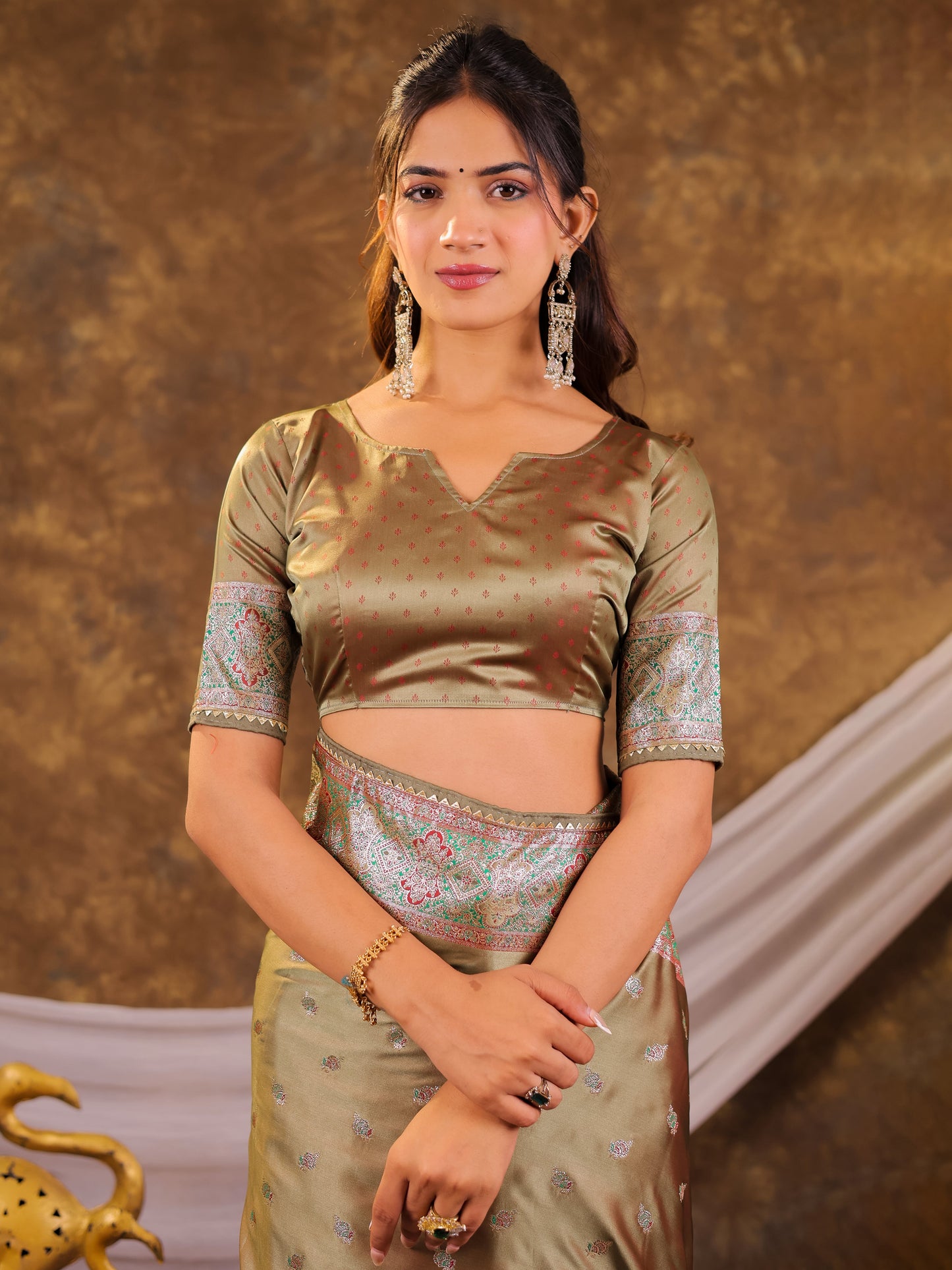 Olive Green Kanjivaram Banarasi Satin Silk Saree with Antique Silver Zari Weaving, Heritage Pallu & Tassel Detailing