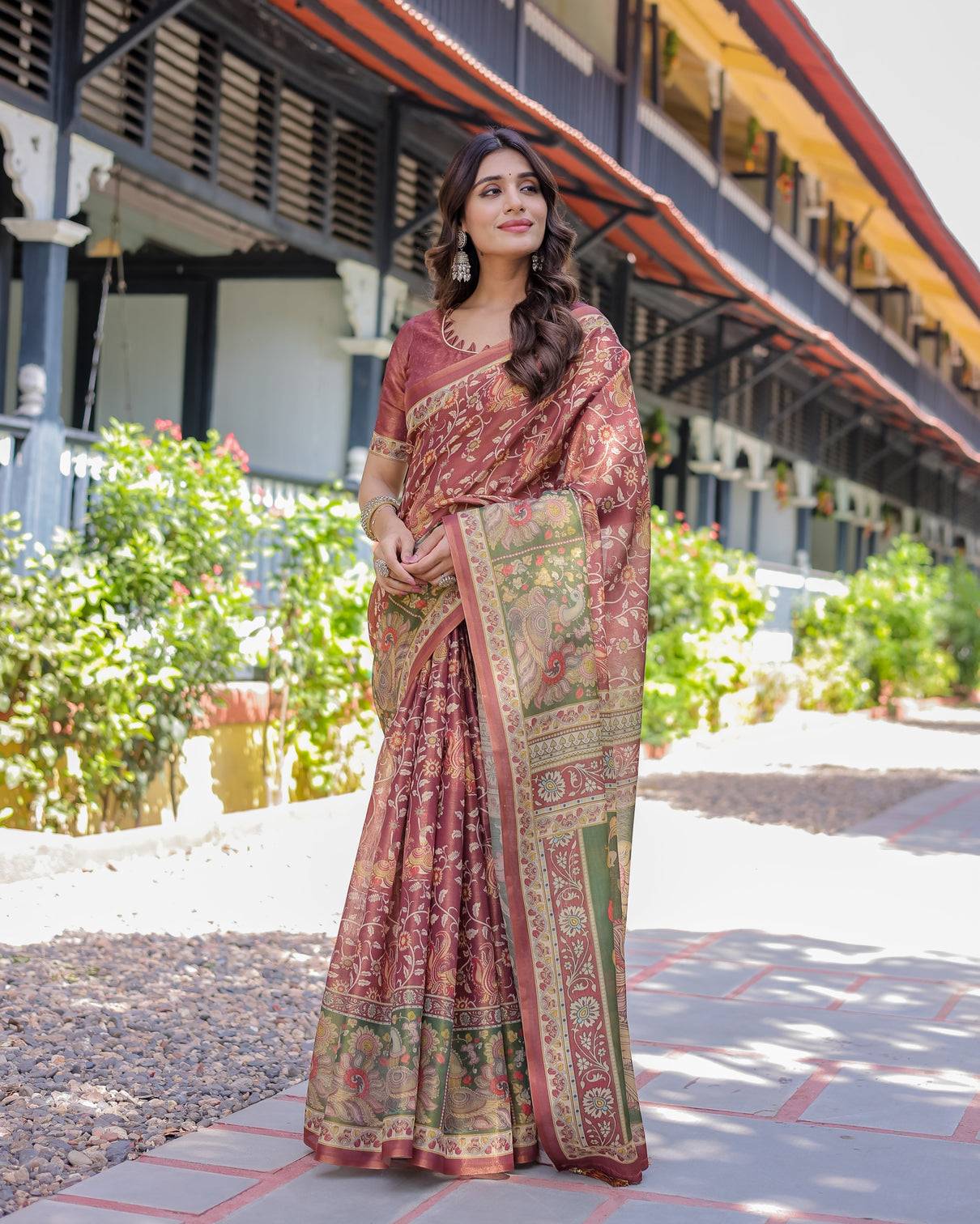 Maroon handloom cotton saree with intricate peacock floral art contrast green pallu