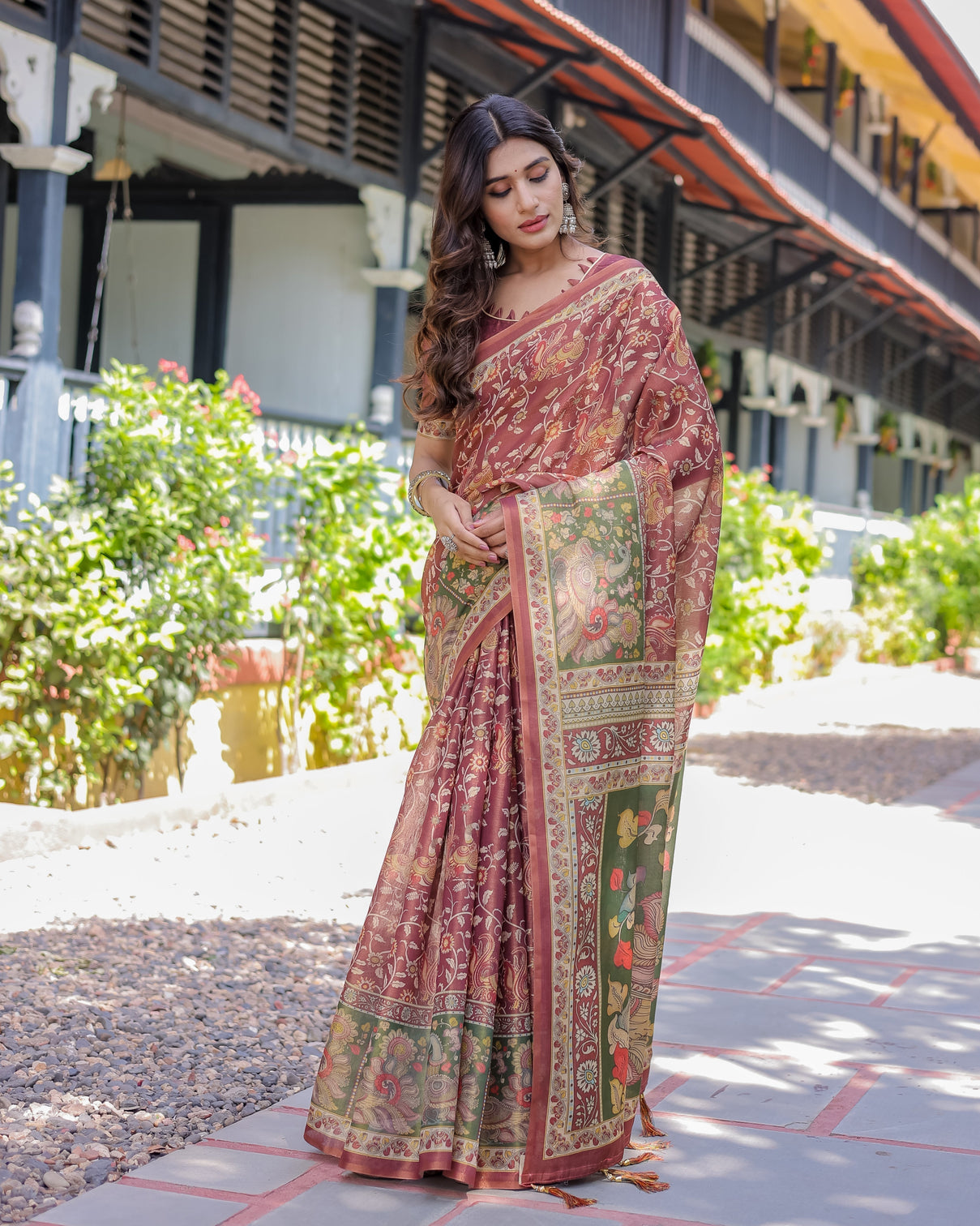 Maroon handloom cotton saree with intricate peacock floral art contrast green pallu