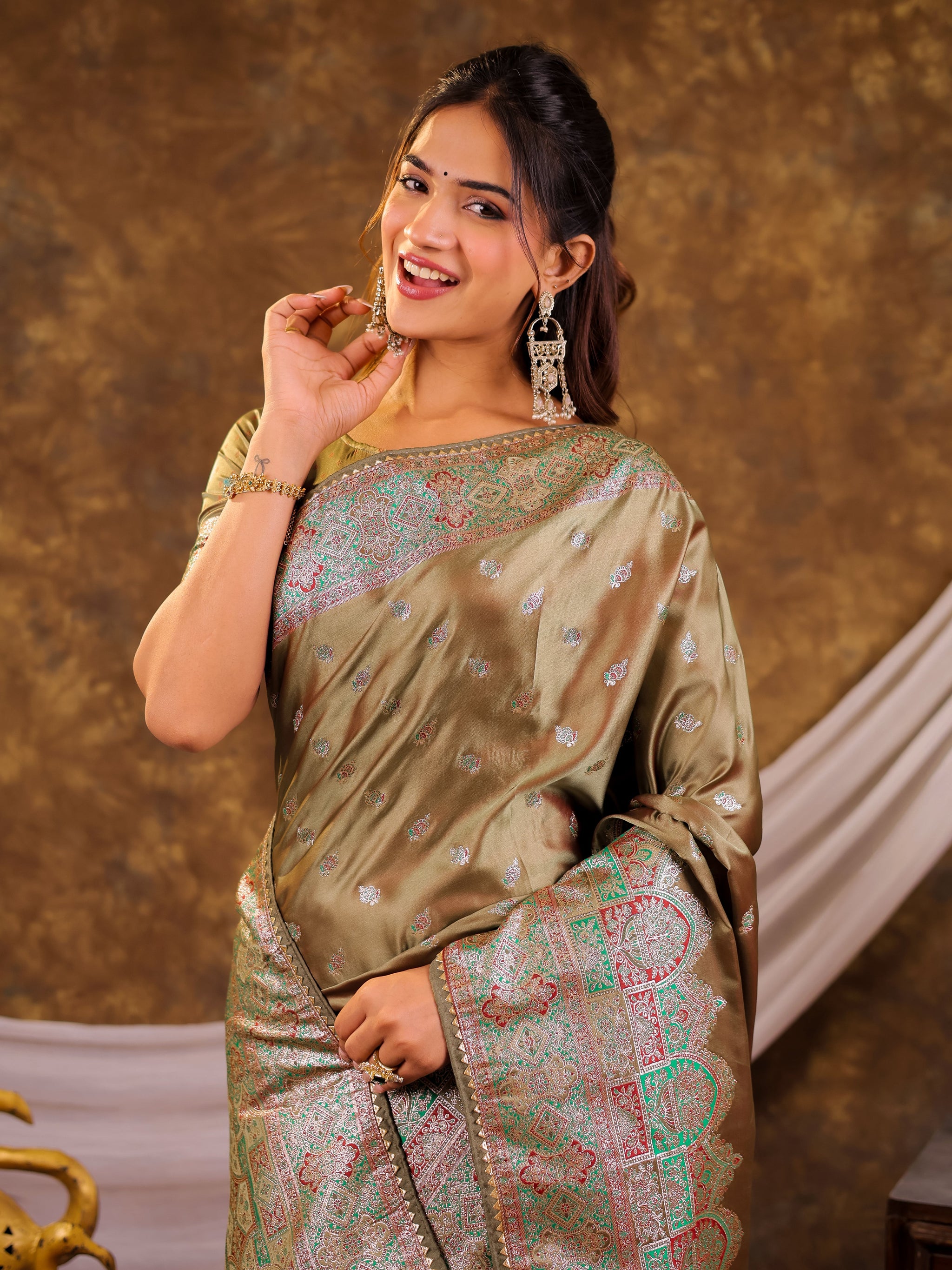 Olive Green Kanjivaram Banarasi Satin Silk Saree with Antique Silver Zari Weaving, Heritage Pallu & Tassel Detailing