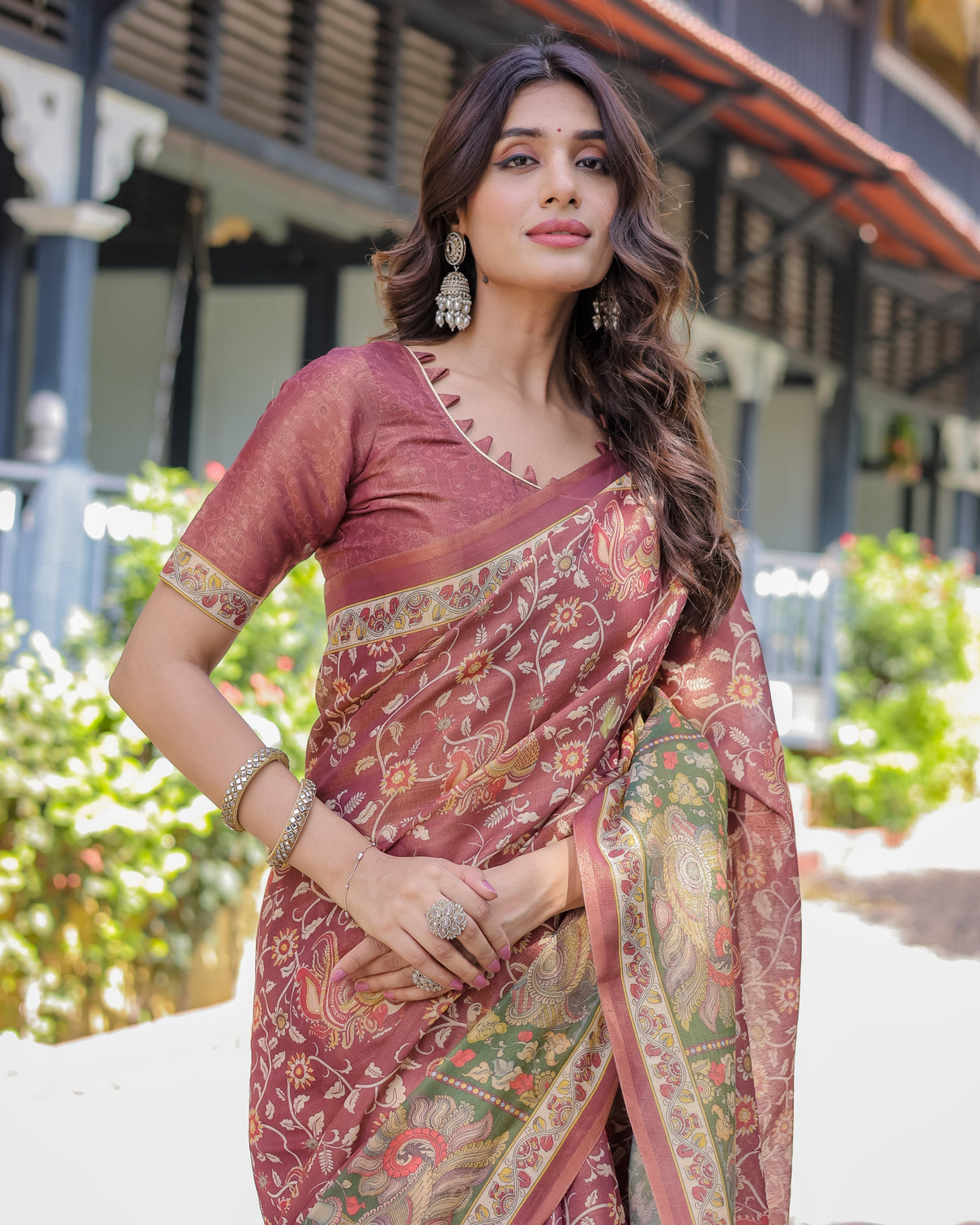Maroon handloom cotton saree with intricate peacock floral art contrast green pallu