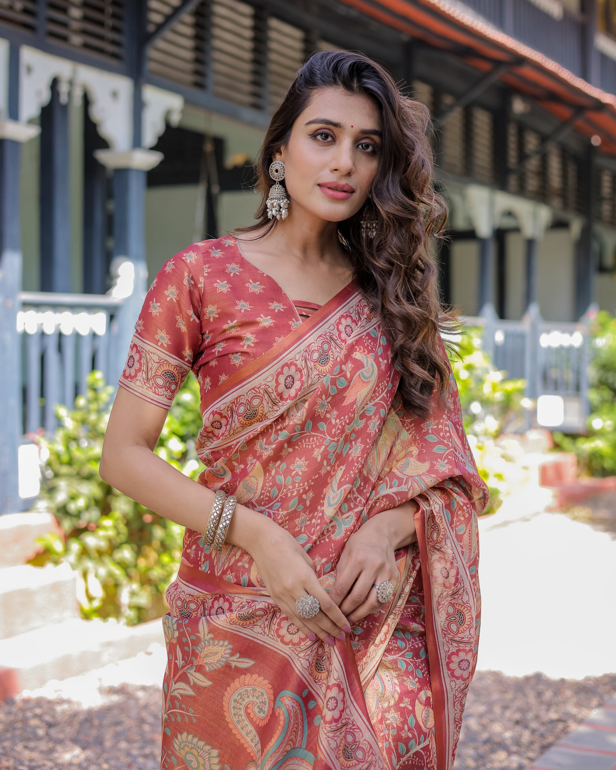 Rust red handloom cotton saree with artistic peacock floral print contrast blouse included