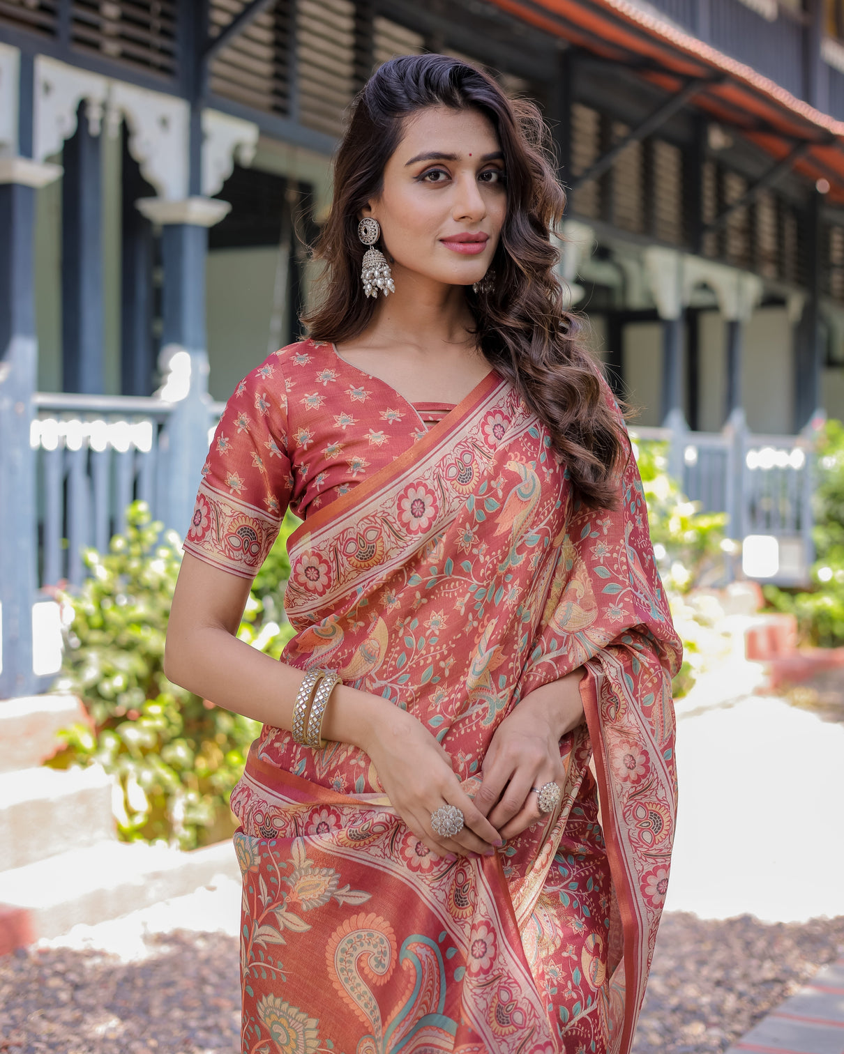 Rust red handloom cotton saree with artistic peacock floral print contrast blouse included