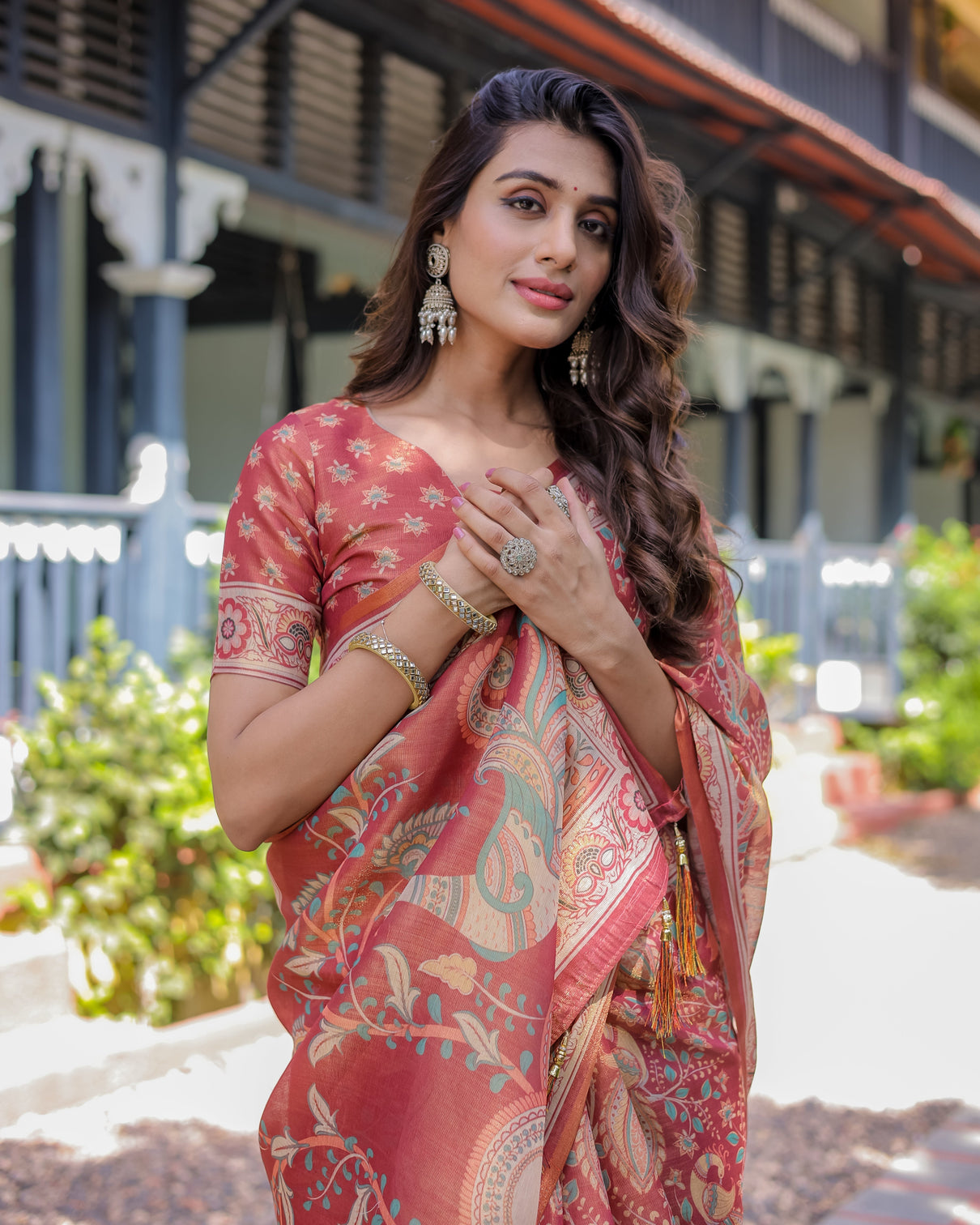 Rust red handloom cotton saree with artistic peacock floral print contrast blouse included
