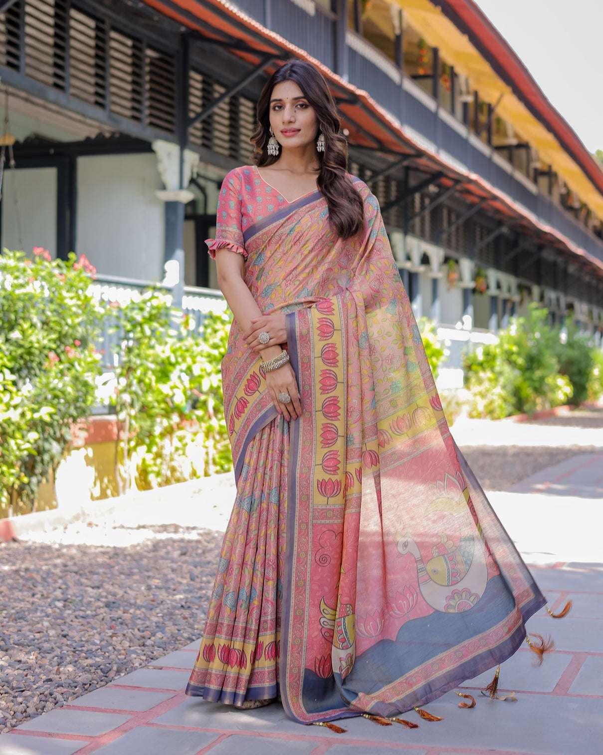 Peach pink handloom cotton saree with lotus bird motifs and navy border pallu mameraa