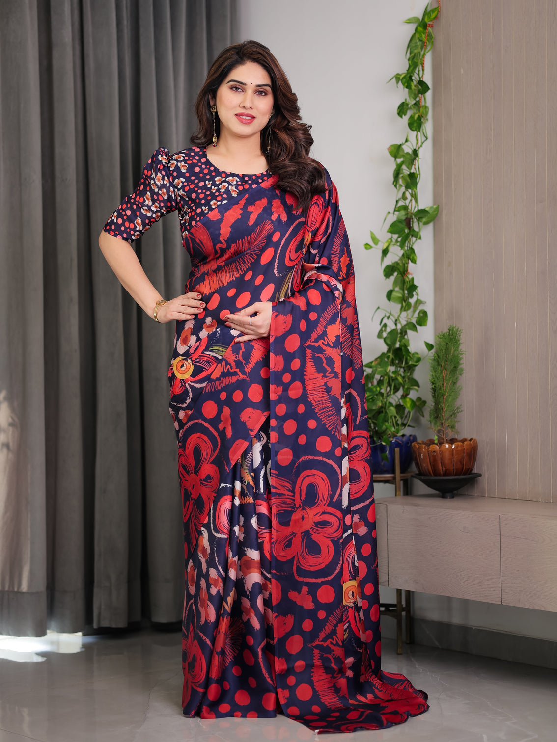 Navy blue abstract floral polka print satin georgette saree with red brushstroke motifs designer attached blouse