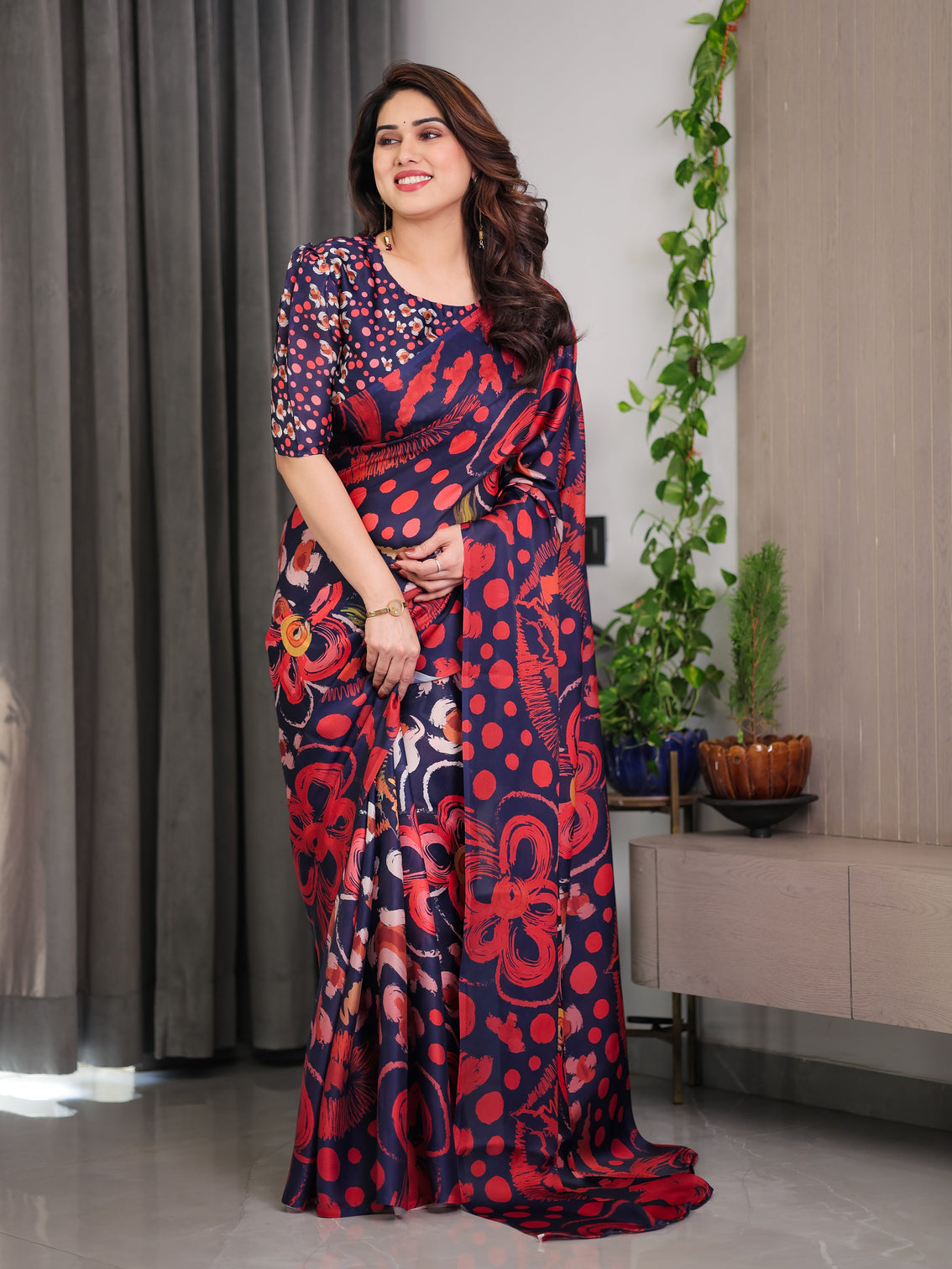 Navy blue abstract floral polka print satin georgette saree with red brushstroke motifs designer attached blouse