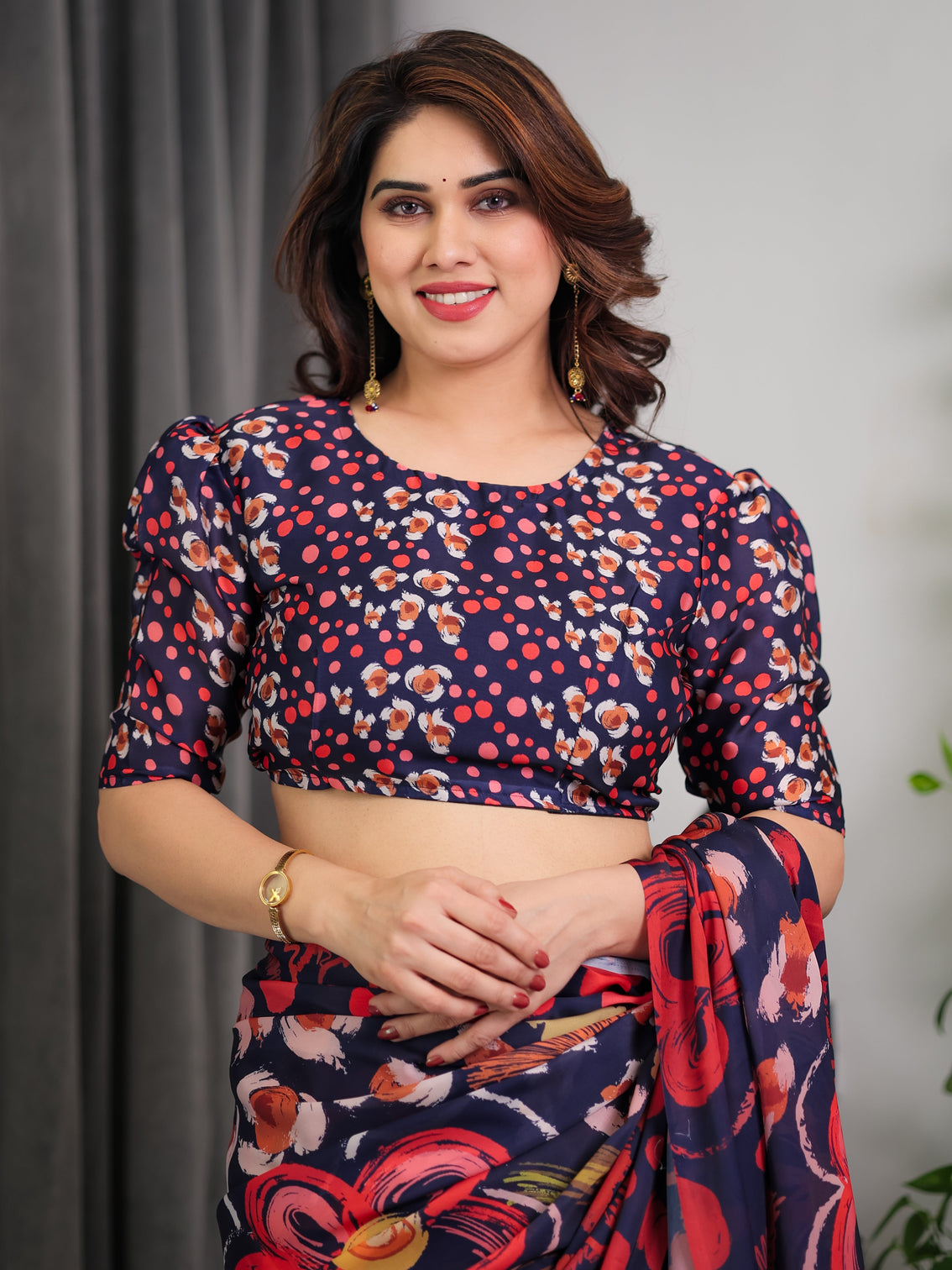 Navy blue abstract floral polka print satin georgette saree with red brushstroke motifs designer attached blouse
