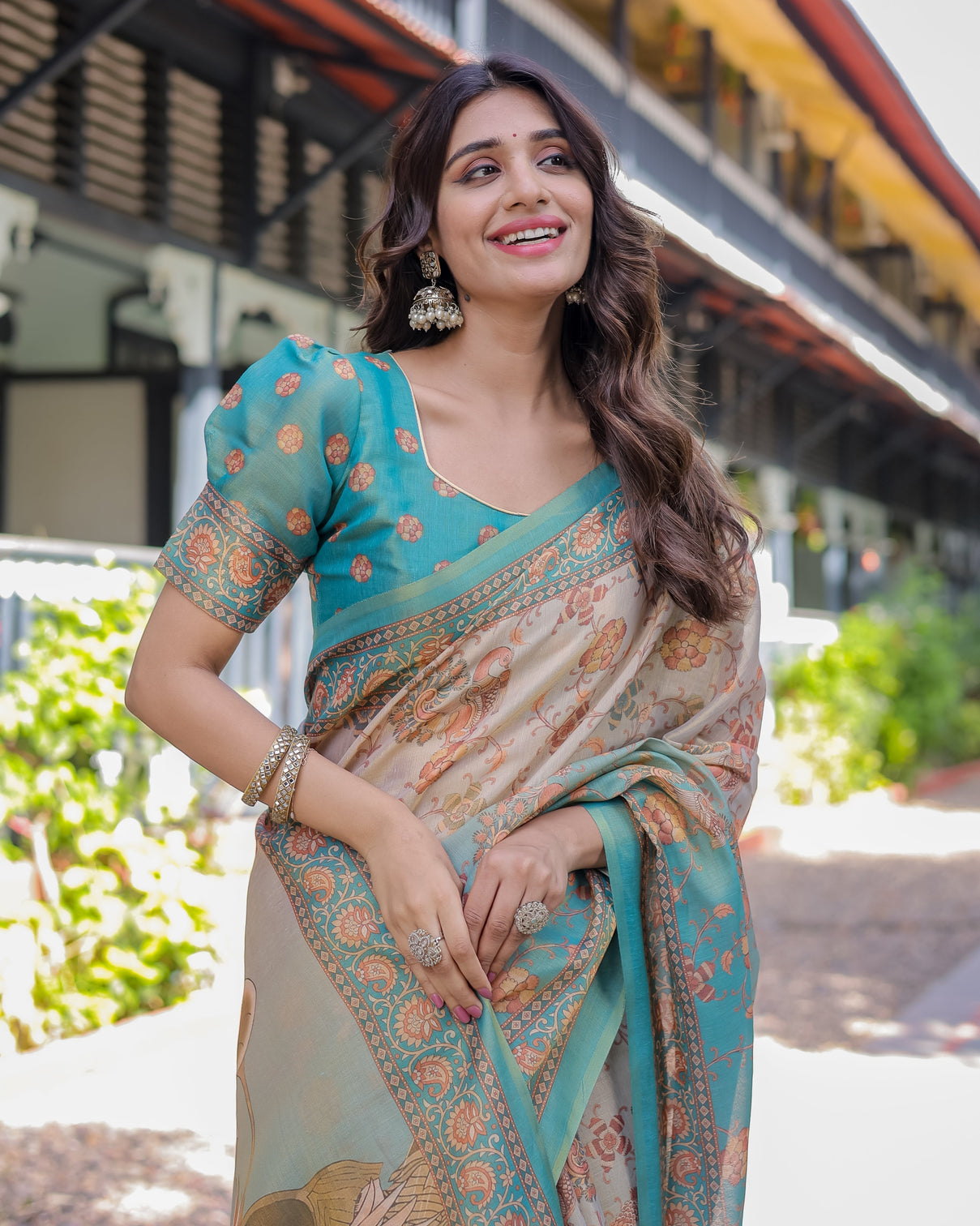 Teal beige handloom cotton saree with swan motif pallu floral digital print