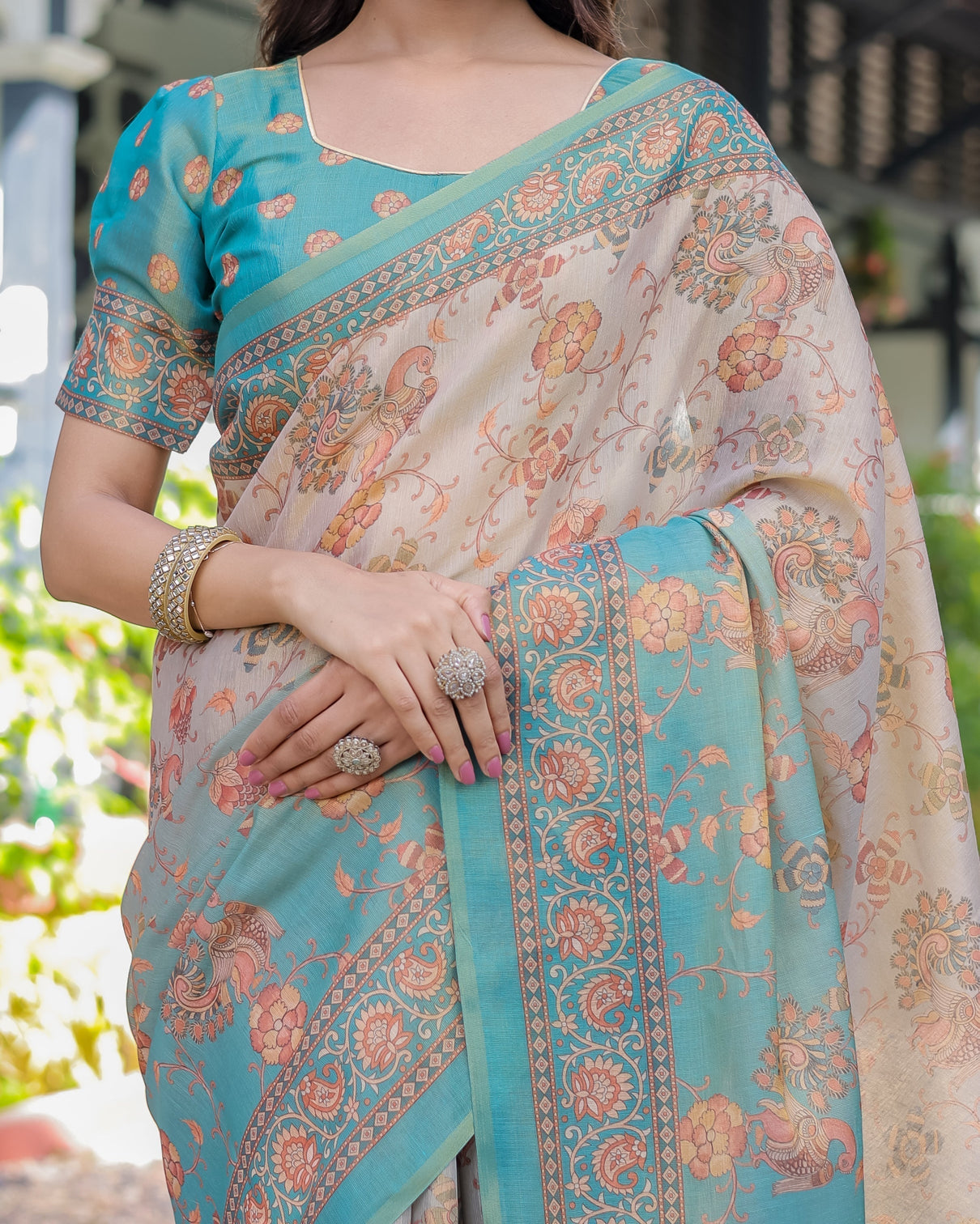Teal beige handloom cotton saree with swan motif pallu floral digital print