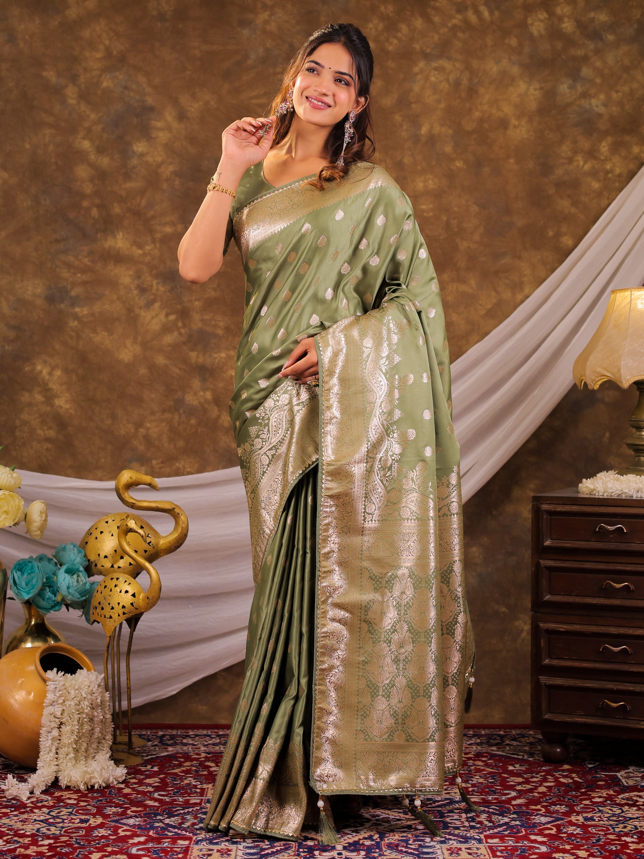 Sage Green Kanjivaram Banarasi Satin Silk Saree with Antique Silver Zari Weaving, Rich Heritage Pallu & Tassel Detailing