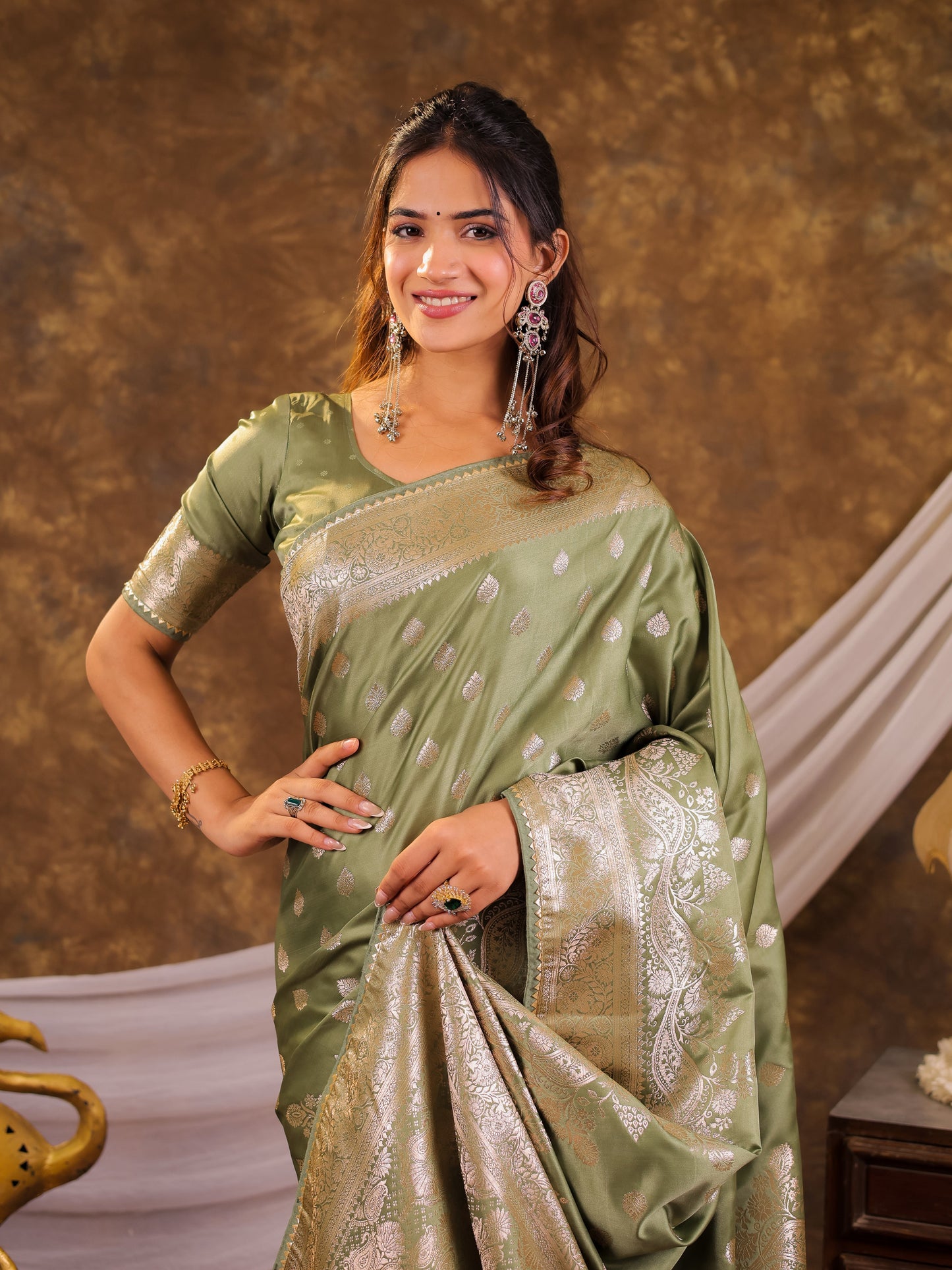 Sage Green Kanjivaram Banarasi Satin Silk Saree with Antique Silver Zari Weaving, Rich Heritage Pallu & Tassel Detailing