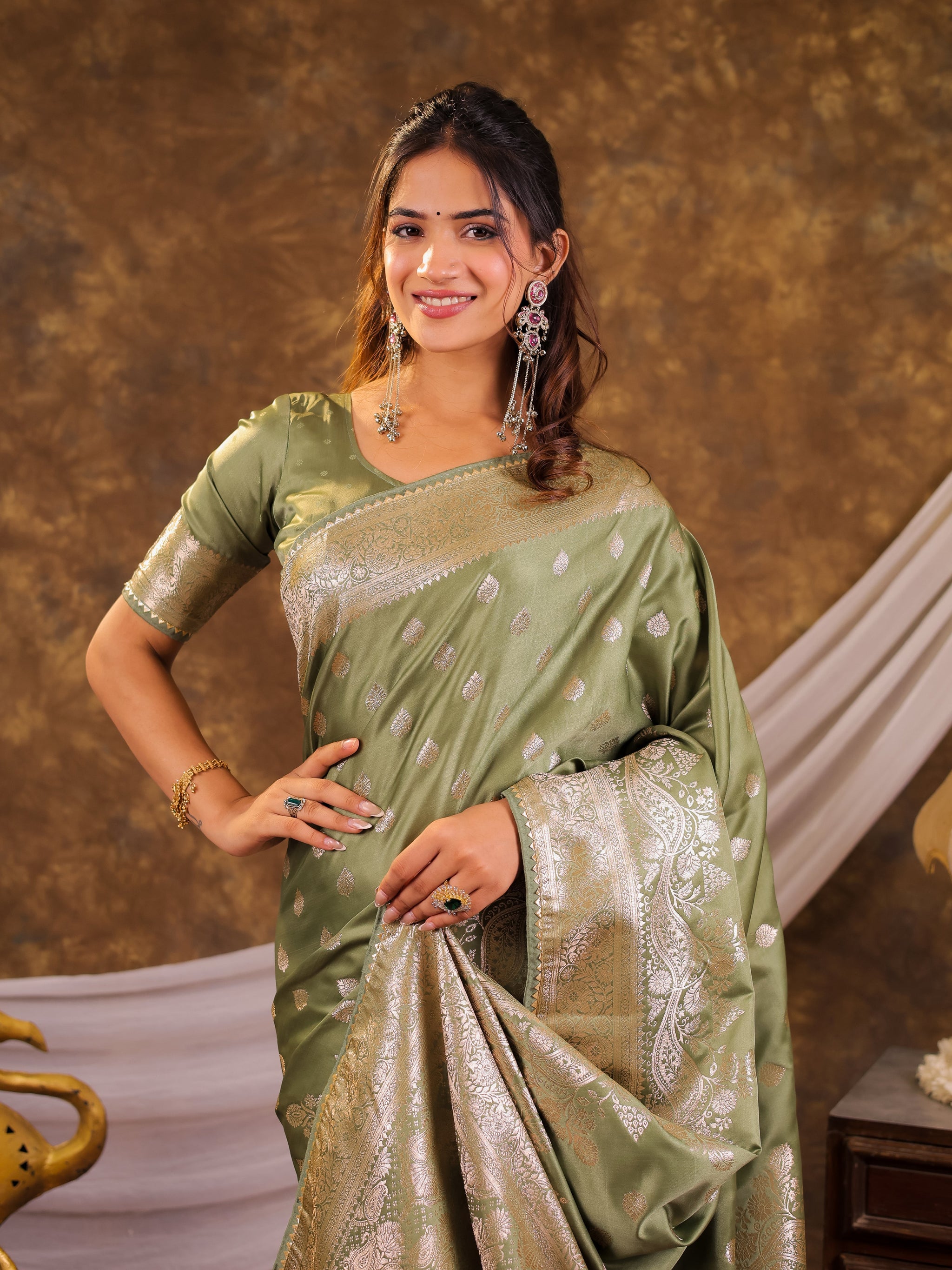 Sage Green Kanjivaram Banarasi Satin Silk Saree with Antique Silver Zari Weaving, Rich Heritage Pallu & Tassel Detailing