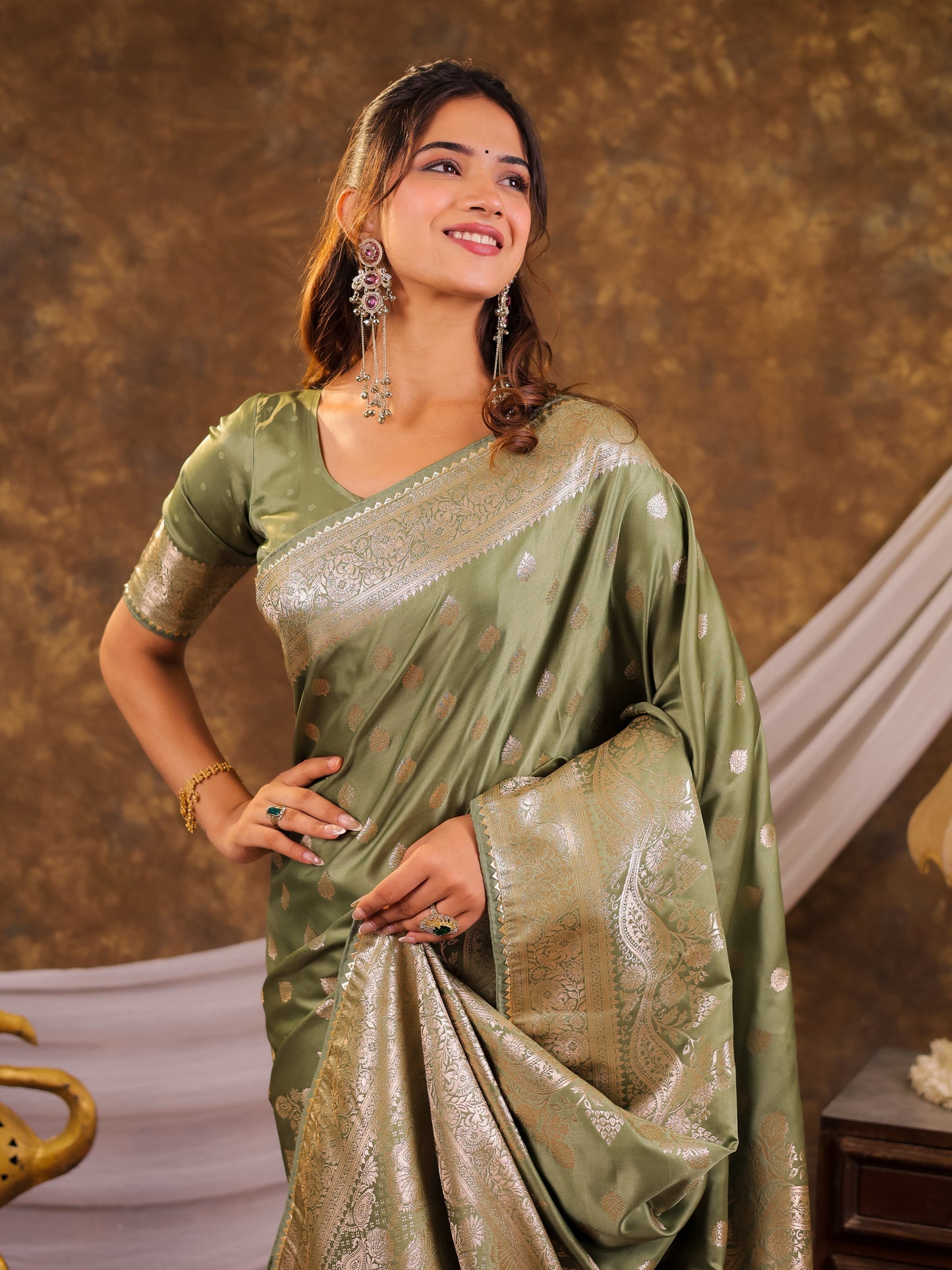 Sage Green Kanjivaram Banarasi Satin Silk Saree with Antique Silver Zari Weaving, Rich Heritage Pallu & Tassel Detailing