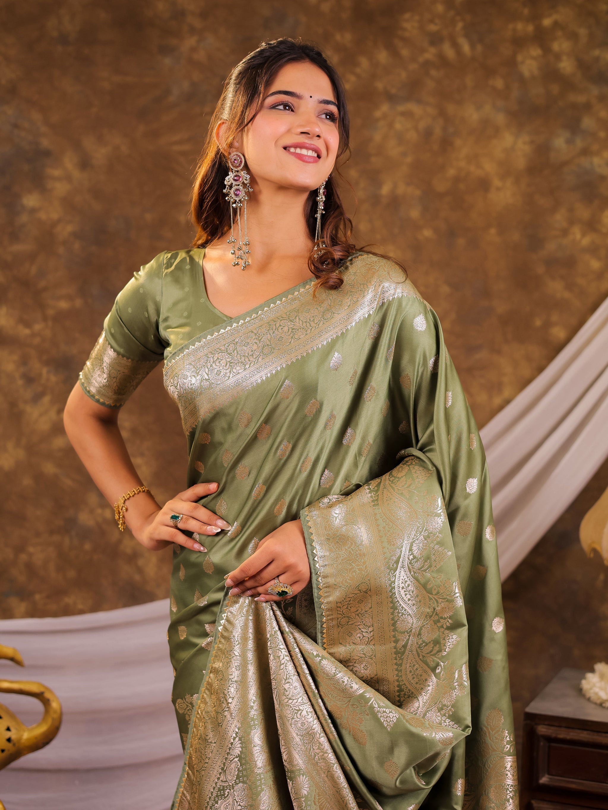 Sage Green Kanjivaram Banarasi Satin Silk Saree with Antique Silver Zari Weaving, Rich Heritage Pallu & Tassel Detailing