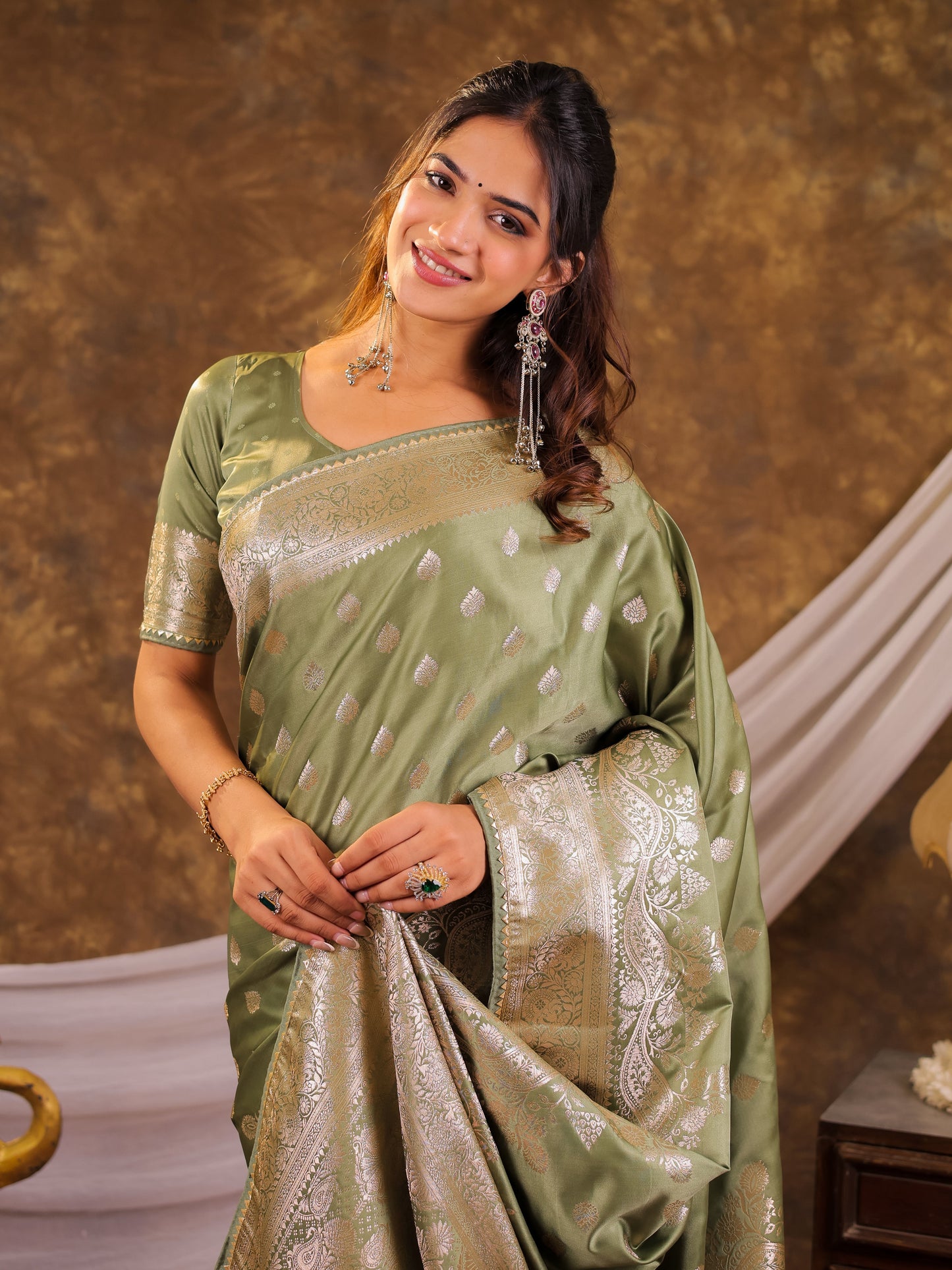 Sage Green Kanjivaram Banarasi Satin Silk Saree with Antique Silver Zari Weaving, Rich Heritage Pallu & Tassel Detailing