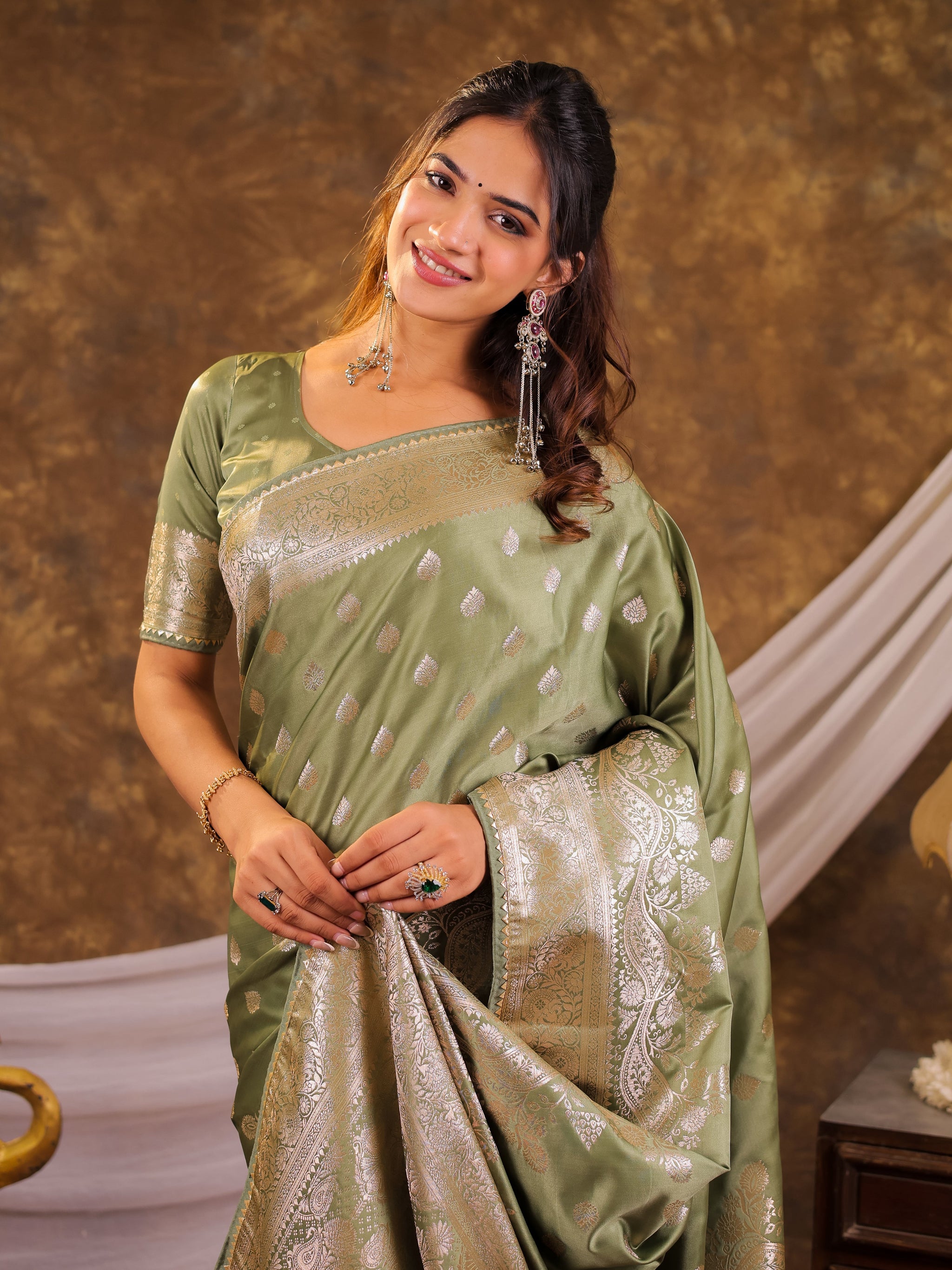 Sage Green Kanjivaram Banarasi Satin Silk Saree with Antique Silver Zari Weaving, Rich Heritage Pallu & Tassel Detailing