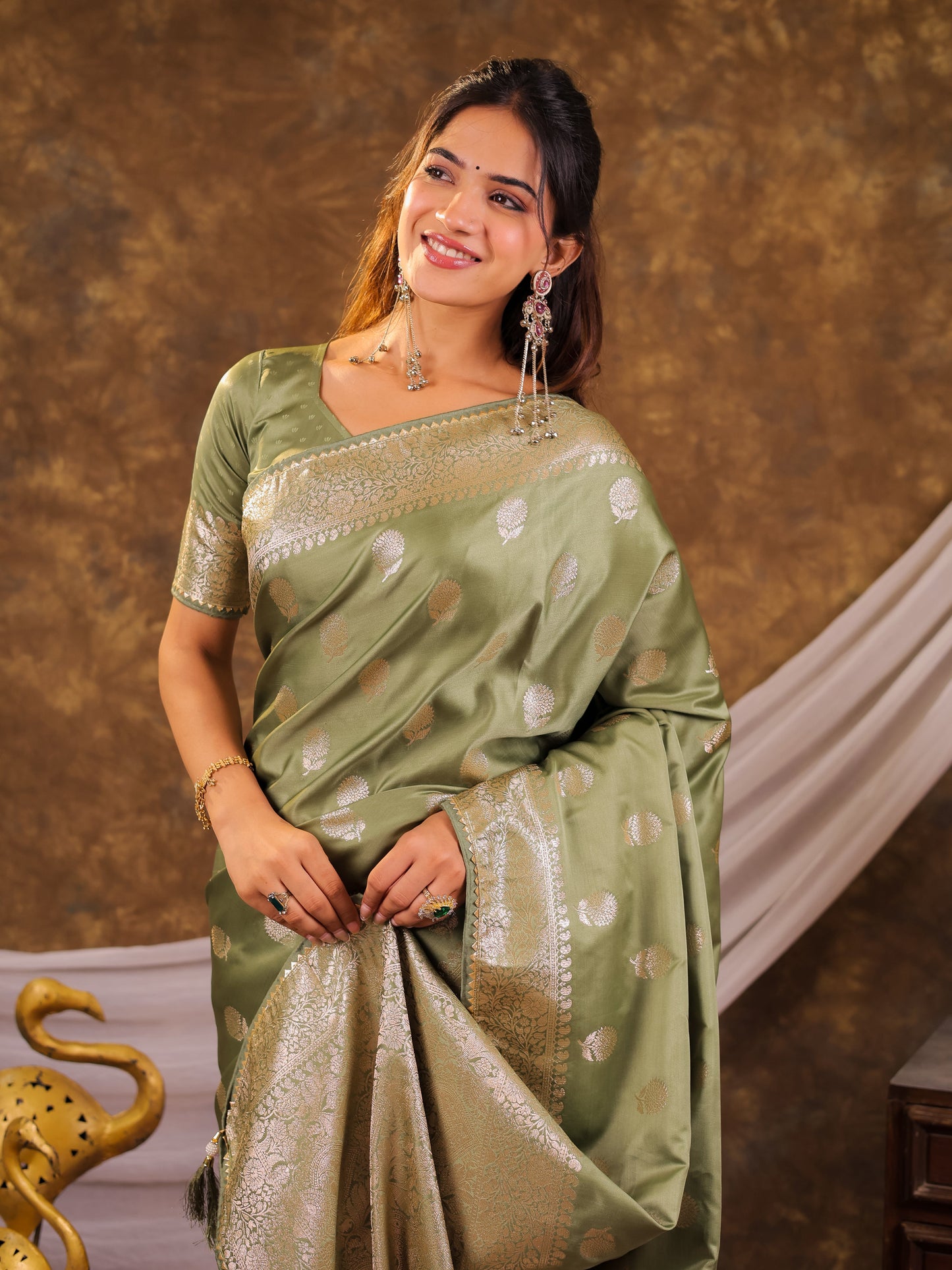 Pistachio Green Kanjivaram Banarasi Satin Silk Saree with Antique Silver Zari Weaving, Rich Heritage Pallu & Tassel Detailing
