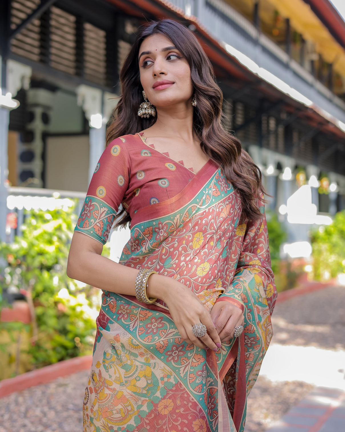 Rust maroon handloom cotton saree with folk procession pallu floral vine print