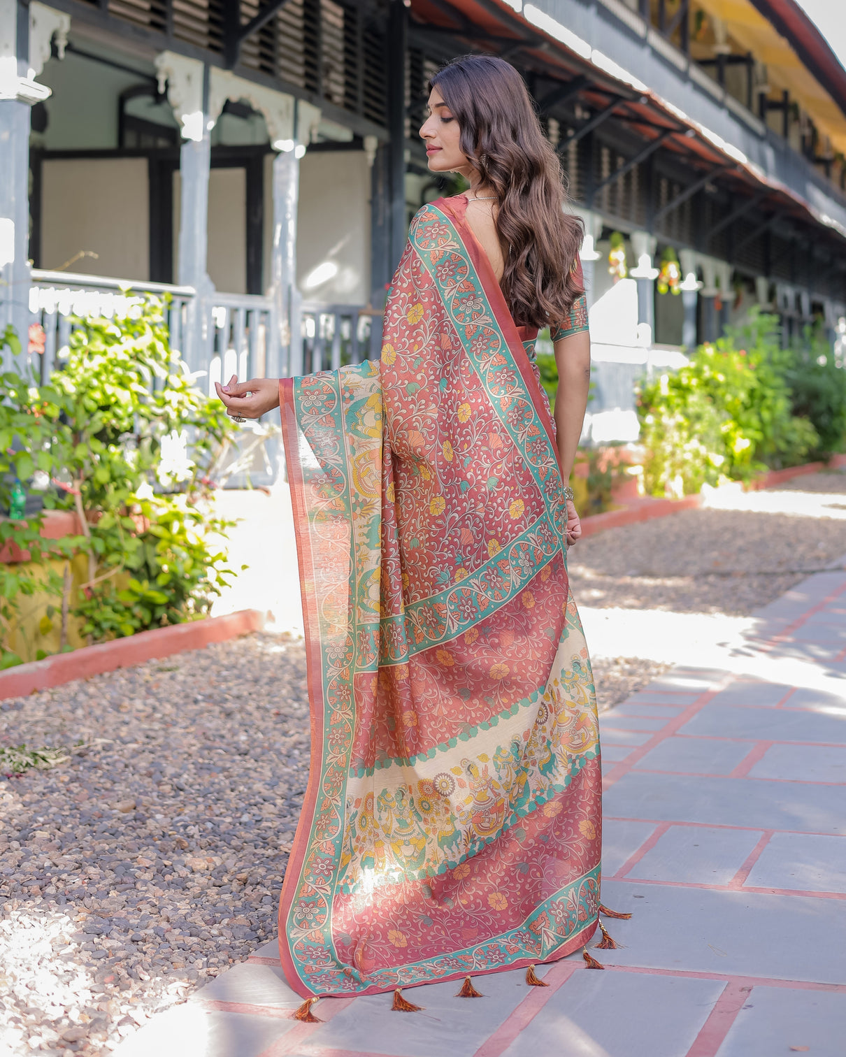 Rust maroon handloom cotton saree with folk procession pallu floral vine print