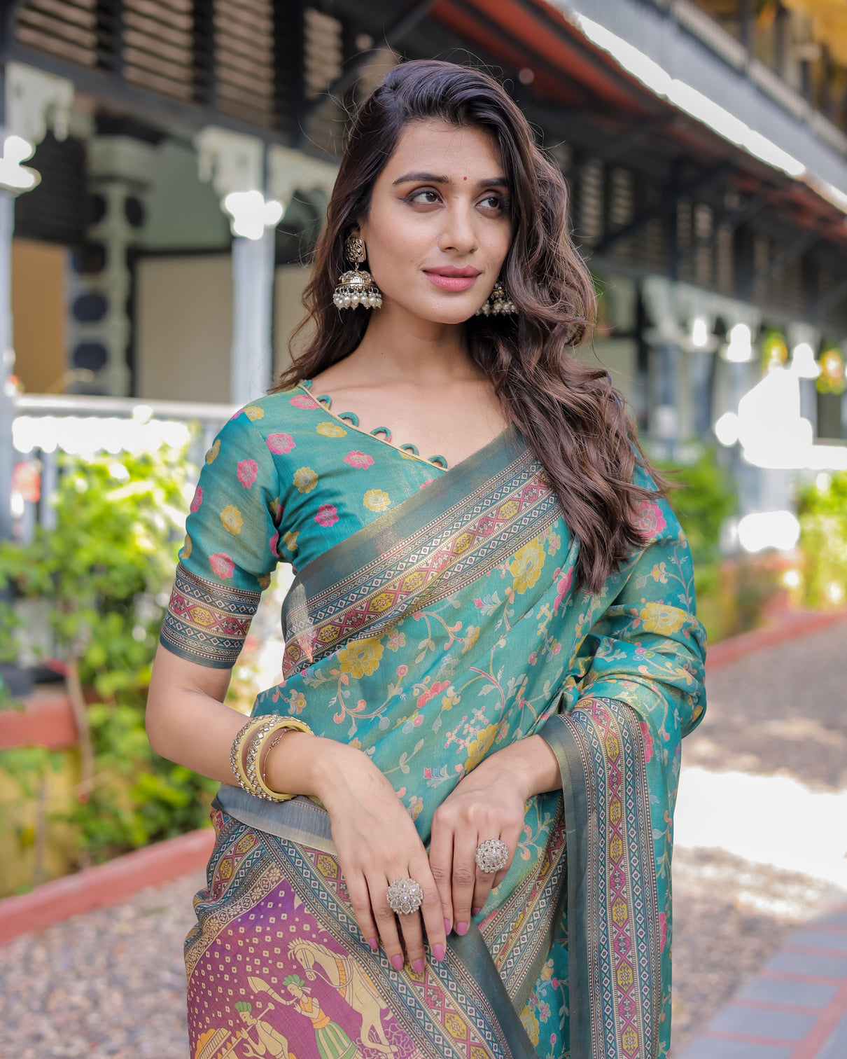 Sea green handloom cotton saree with multicolor floral royal procession pallu