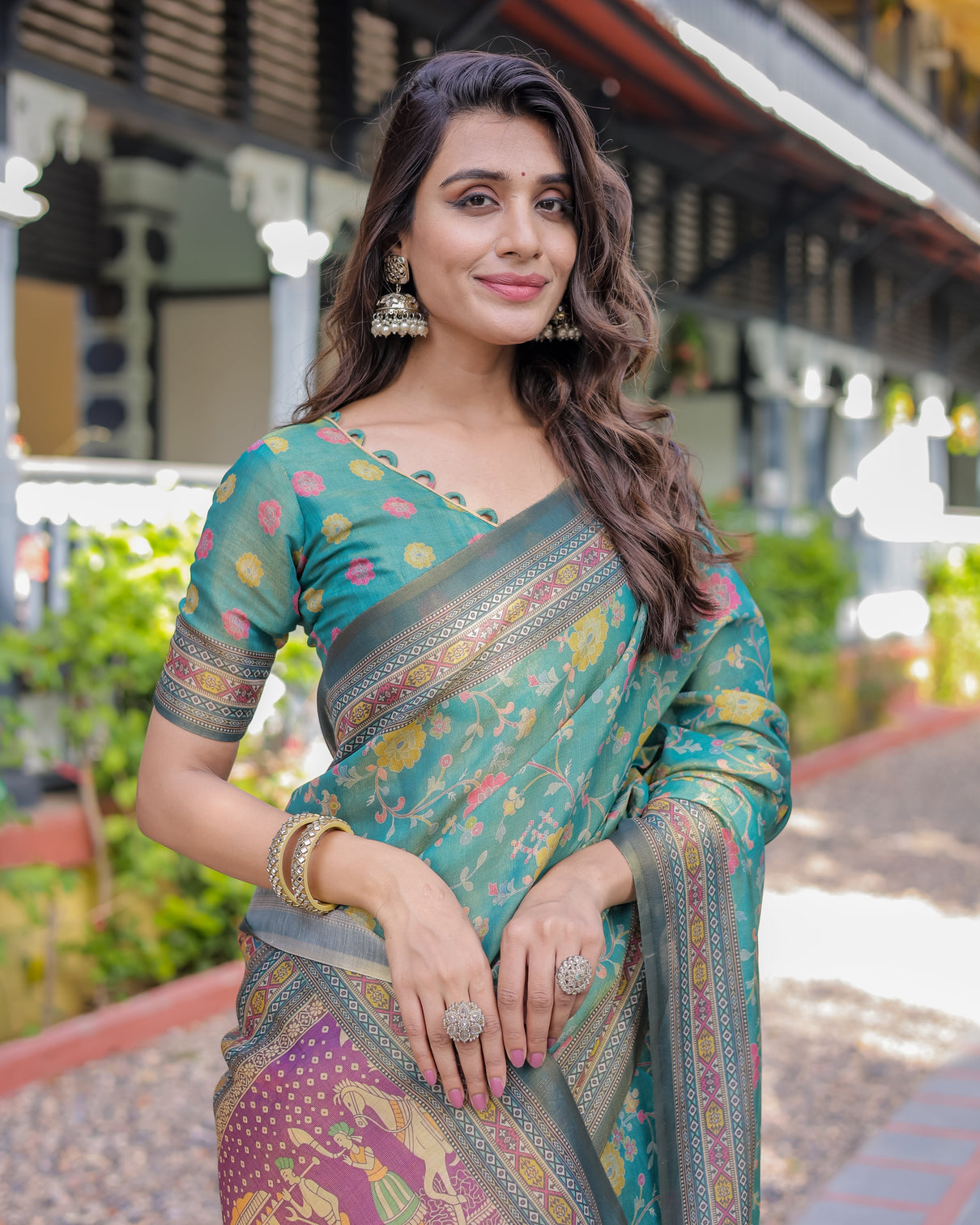 Sea green handloom cotton saree with multicolor floral royal procession pallu