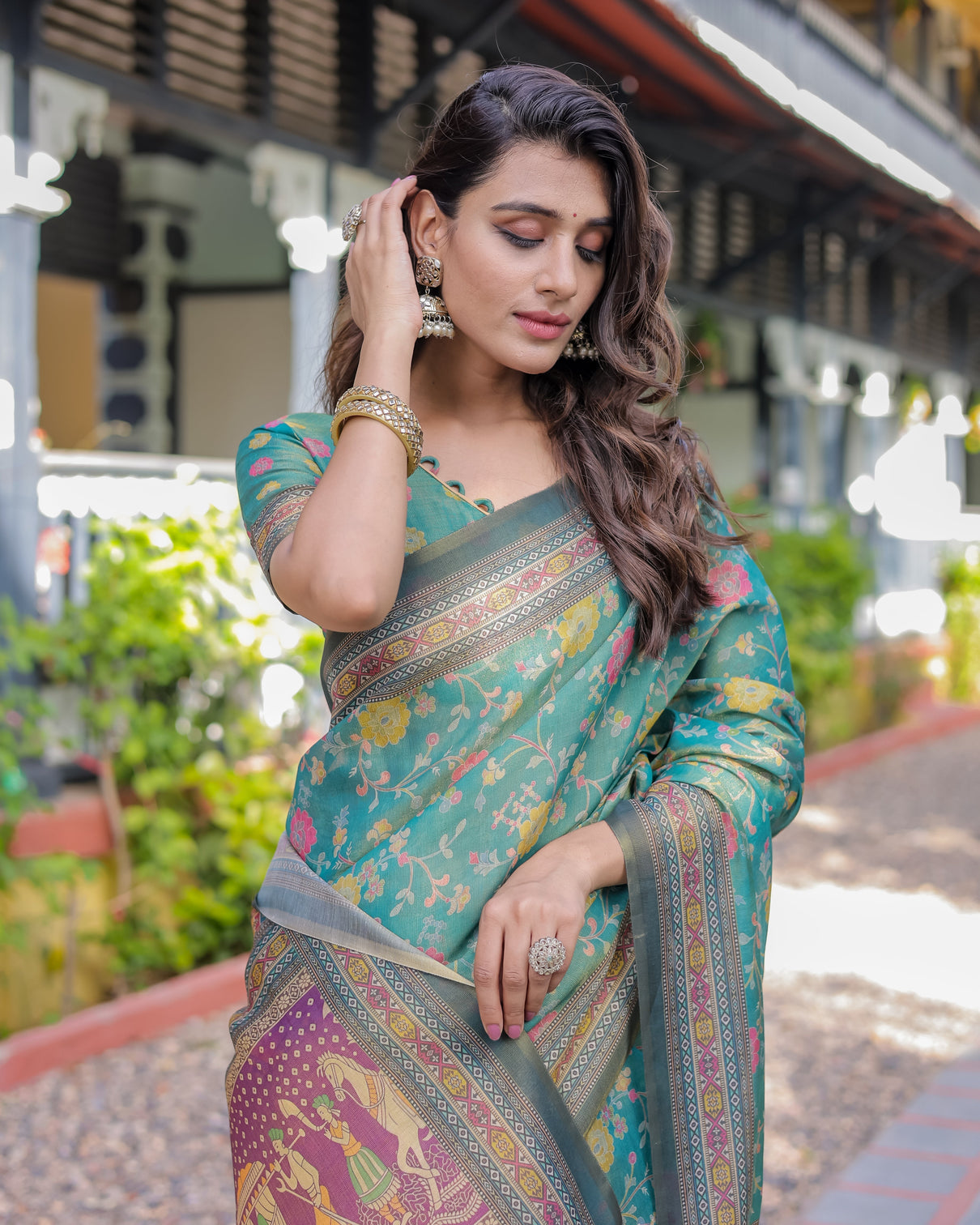Sea green handloom cotton saree with multicolor floral royal procession pallu